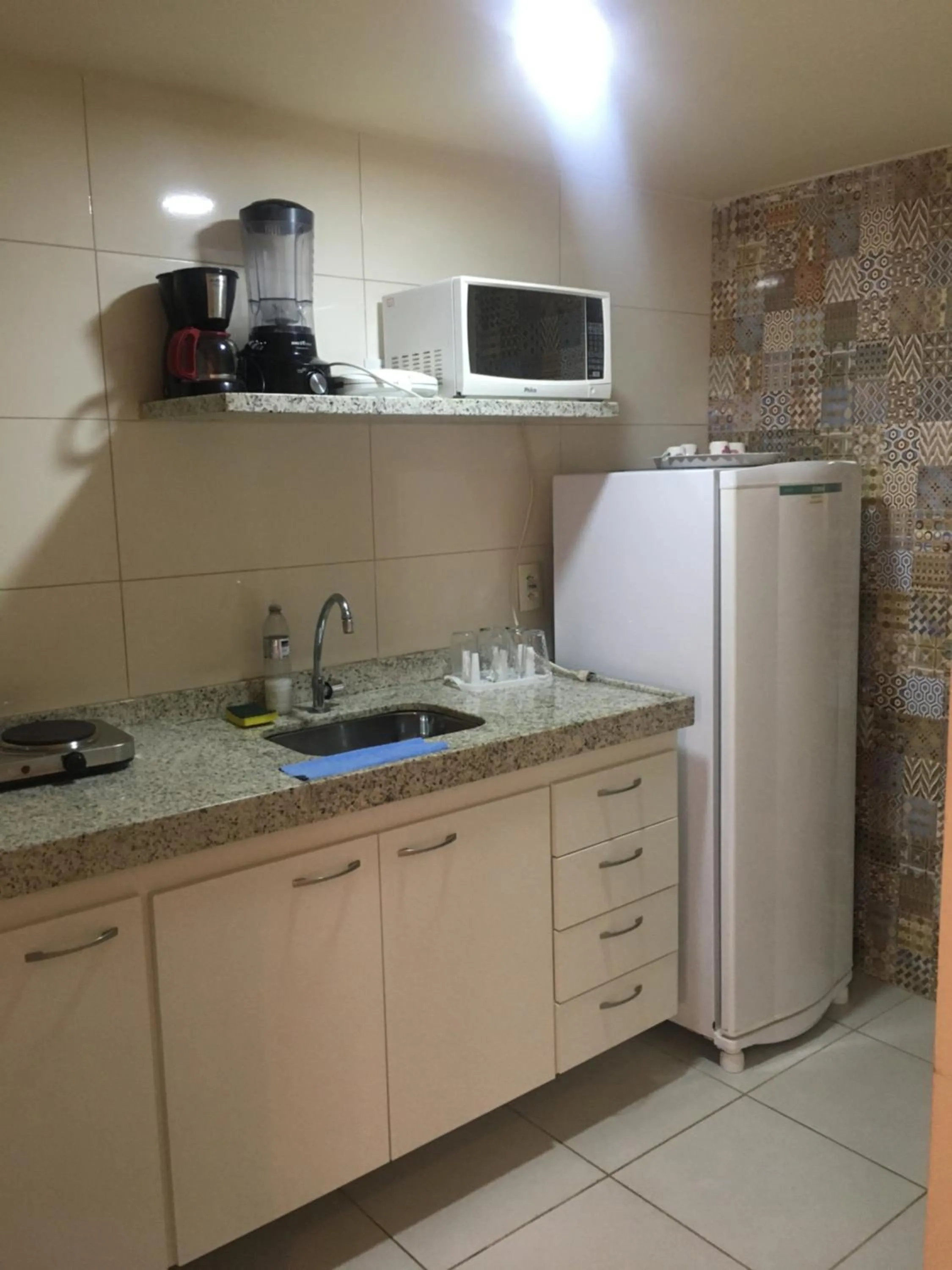 Kitchen or kitchenette in Apartamento no Centro Búzios