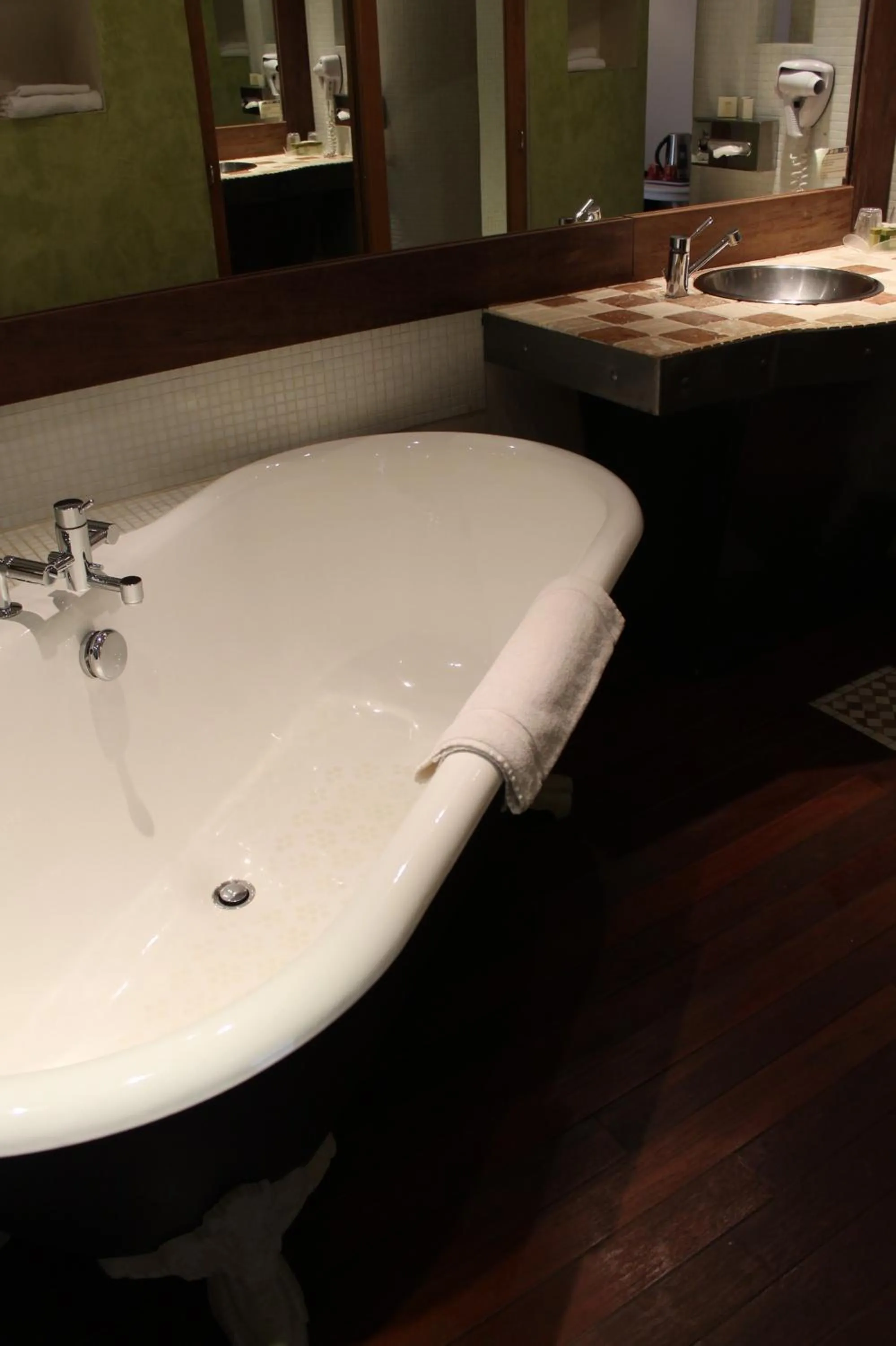 Bathroom in Logis Hôtel Les Pages