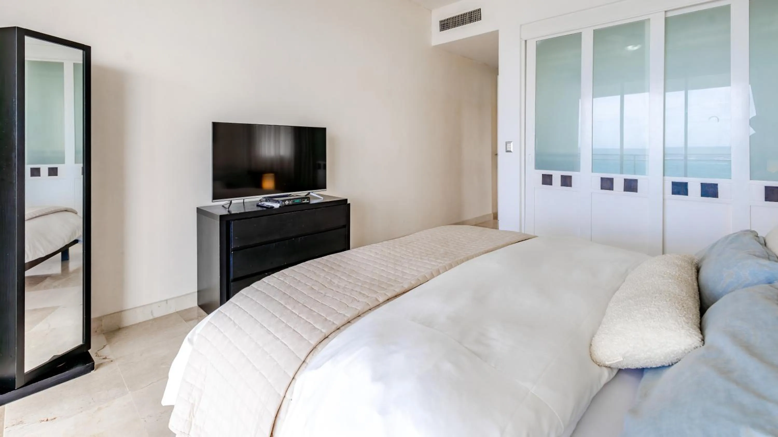 Bed in Watermark Luxury Oceanfront Residences