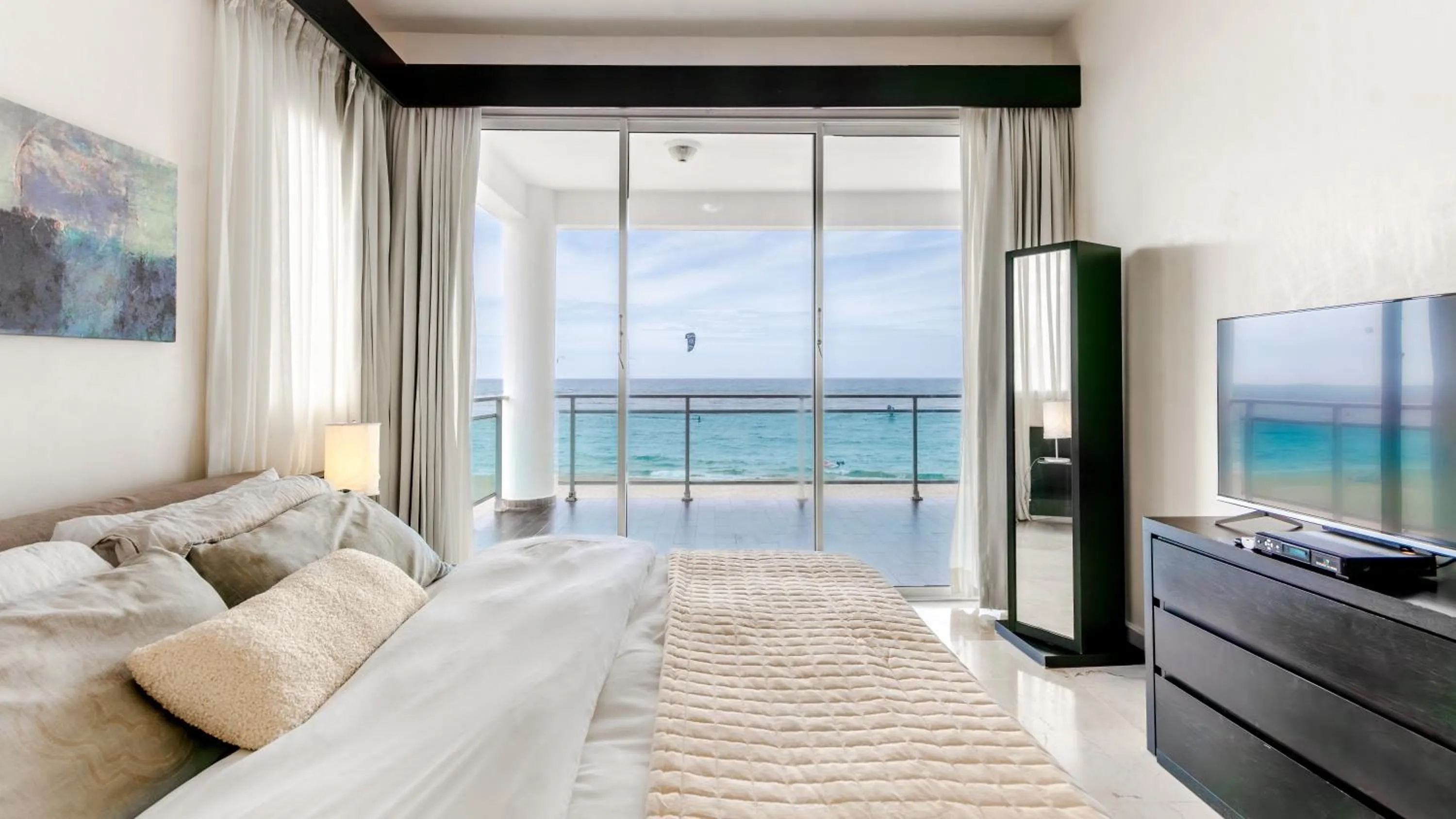 Bed in Watermark Luxury Oceanfront Residences