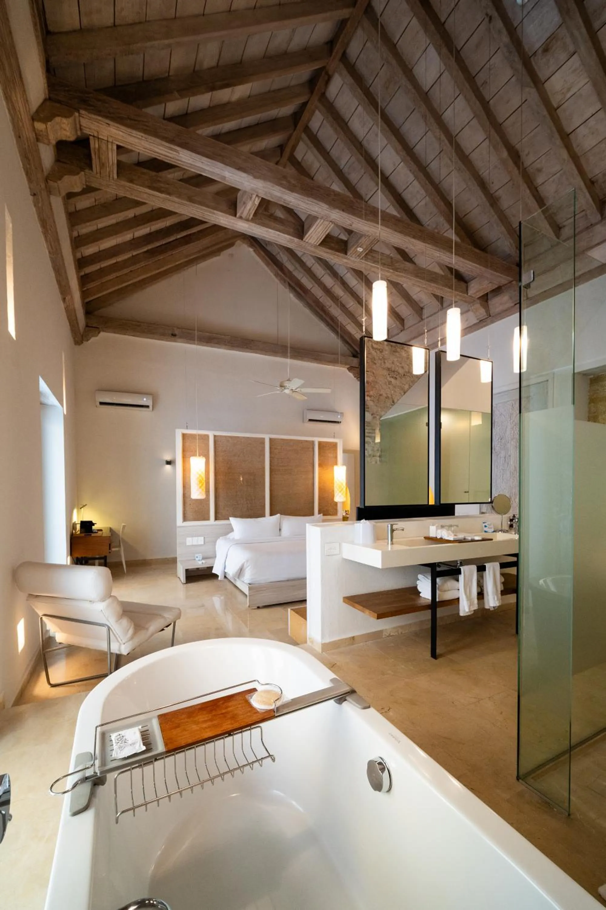 Photo of the whole room, Bed in Nacar Hotel Cartagena, Curio Collection by Hilton