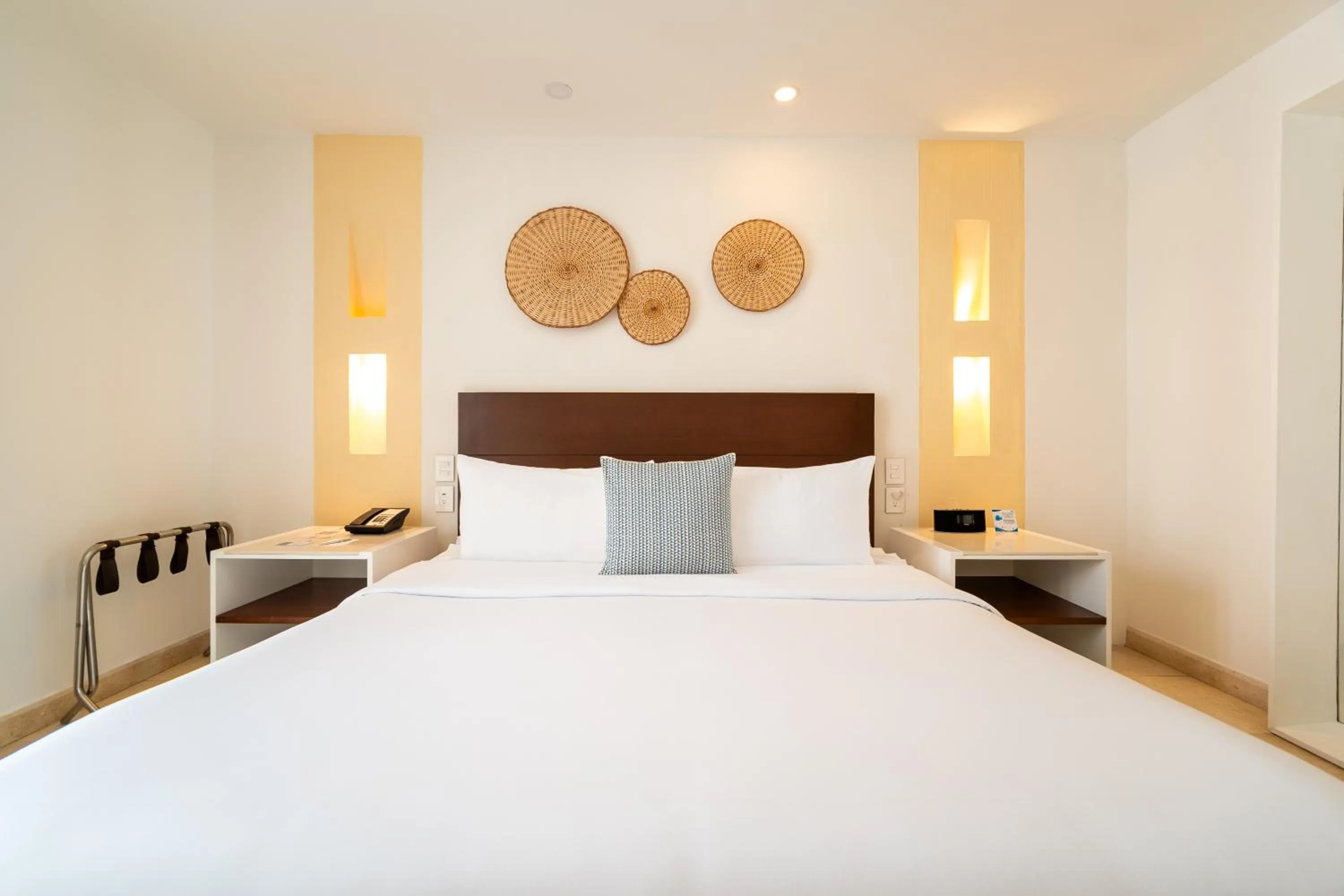Bed in Nacar Hotel Cartagena, Curio Collection by Hilton