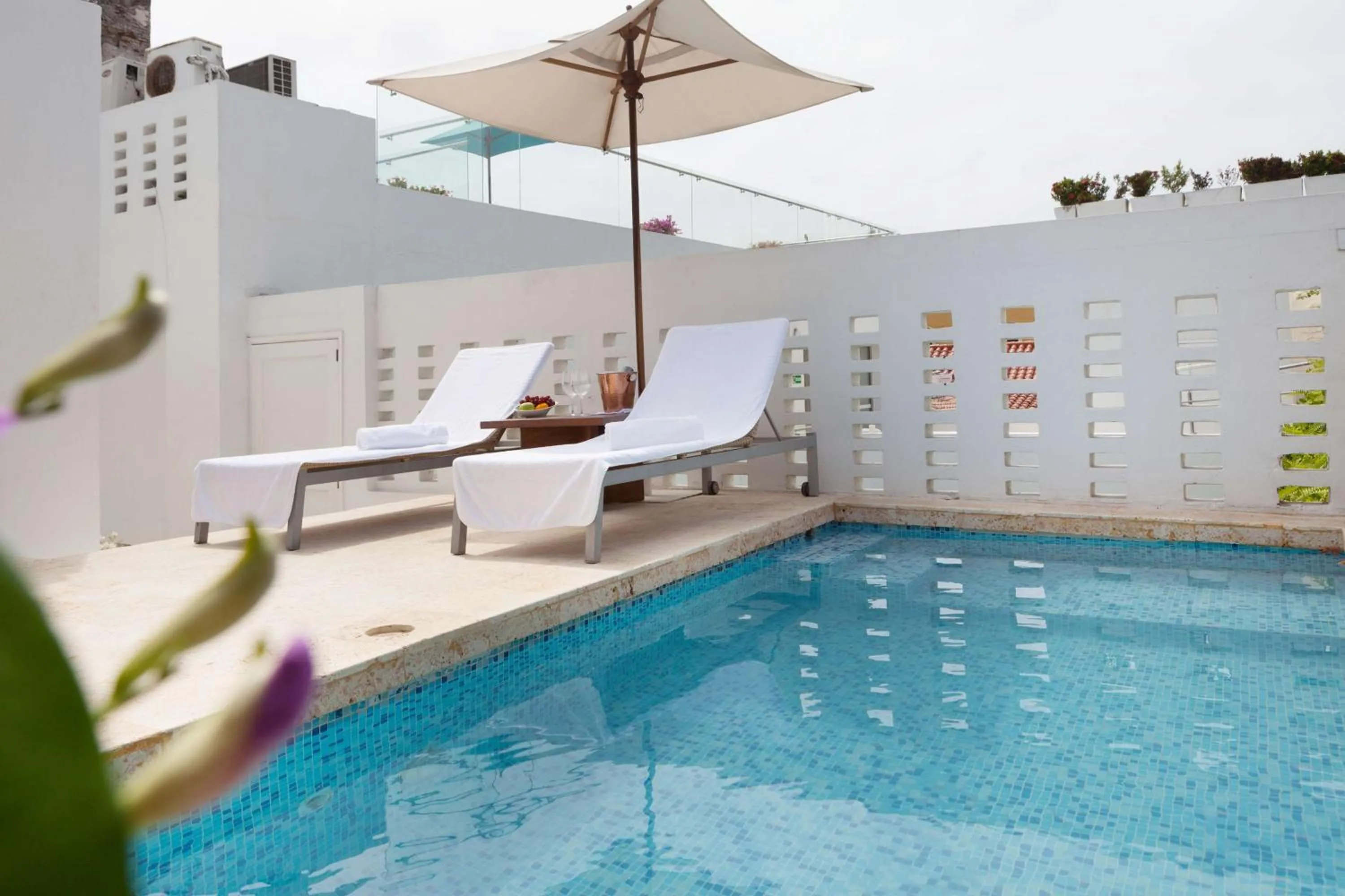 Swimming pool in Nacar Hotel Cartagena, Curio Collection by Hilton