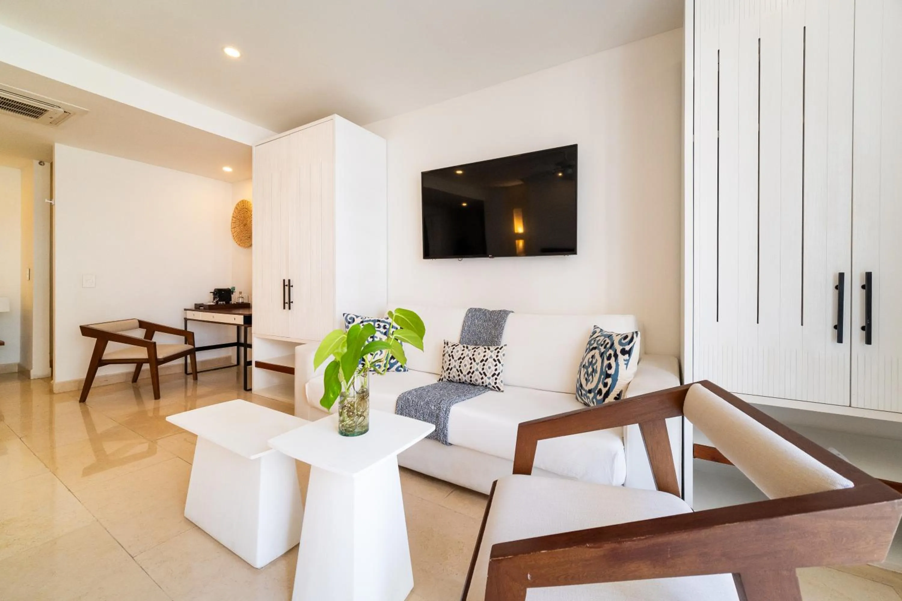 Seating area in Nacar Hotel Cartagena, Curio Collection by Hilton