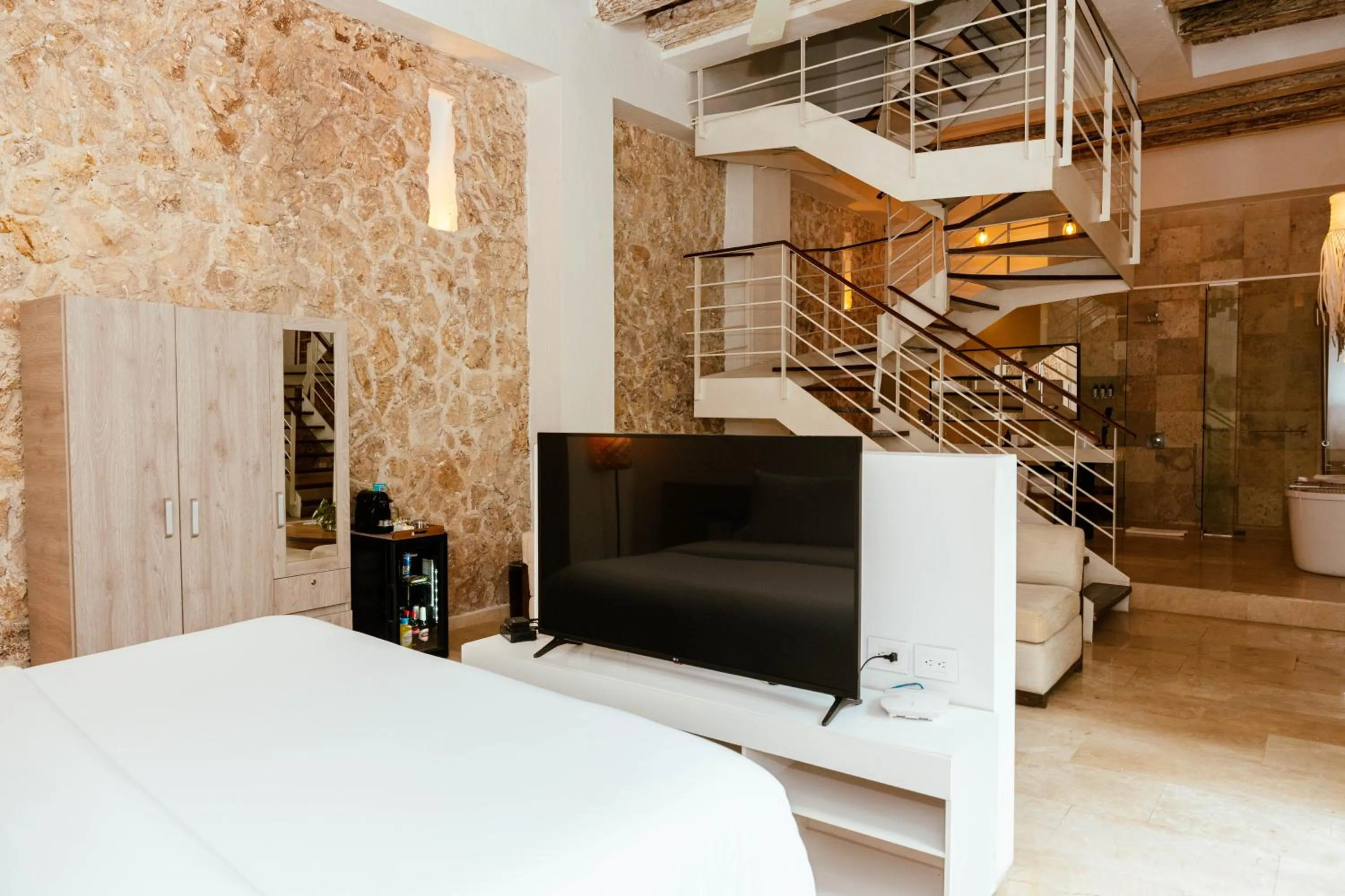 Bedroom, Bed in Nacar Hotel Cartagena, Curio Collection by Hilton