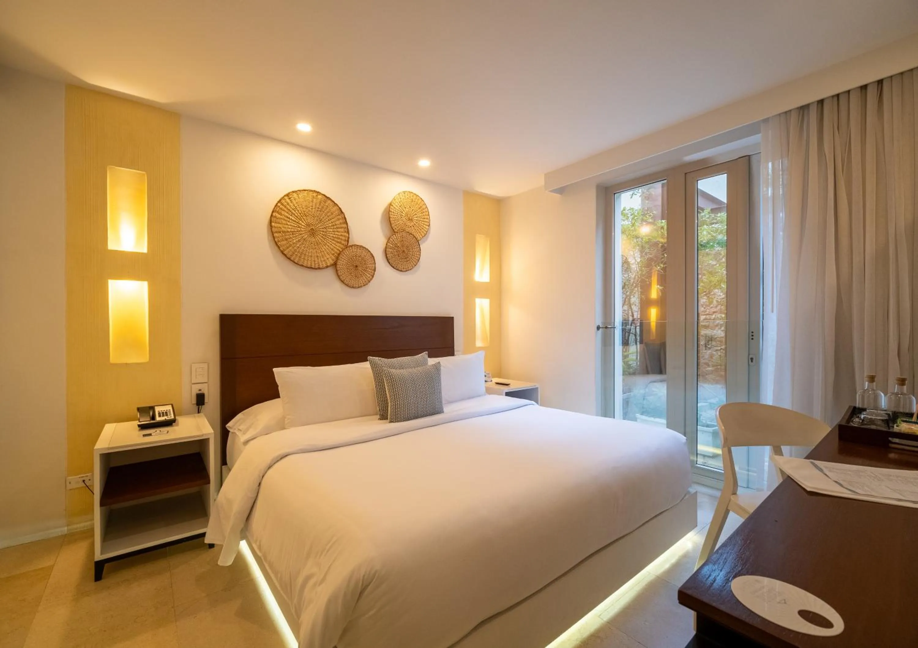 Photo of the whole room, Bed in Nacar Hotel Cartagena, Curio Collection by Hilton