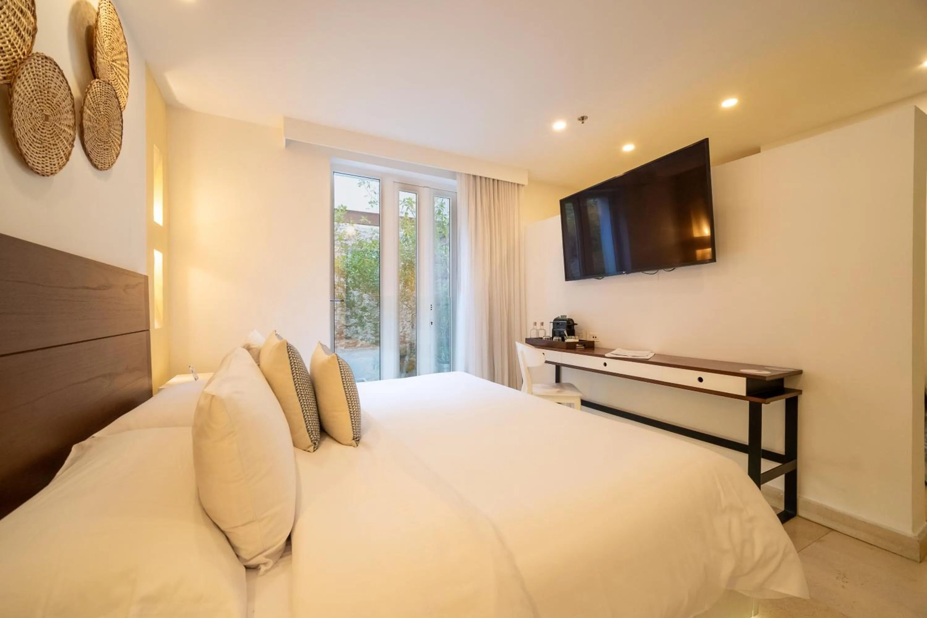 Bedroom, Bed in Nacar Hotel Cartagena, Curio Collection by Hilton