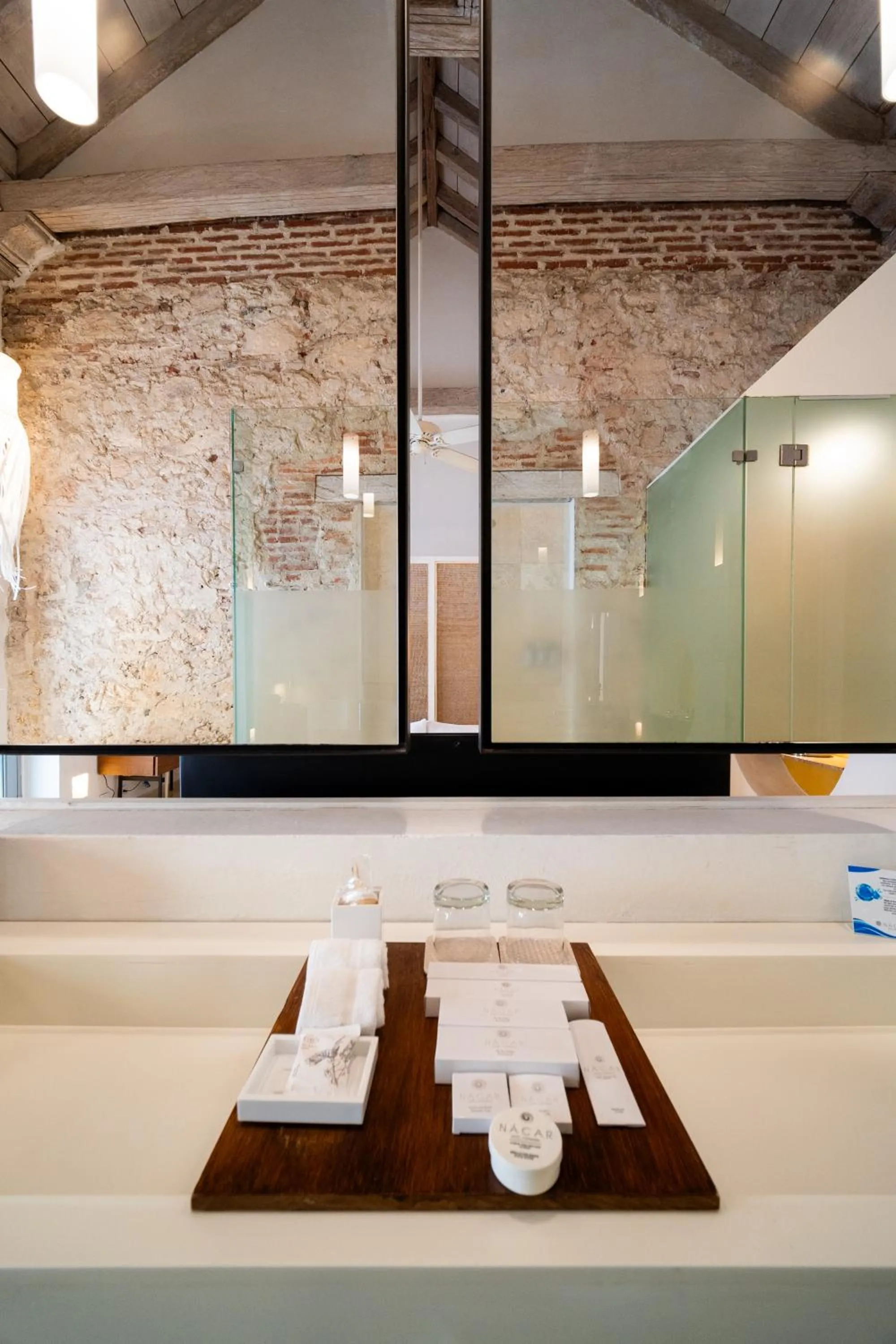 Bathroom in Nacar Hotel Cartagena, Curio Collection by Hilton