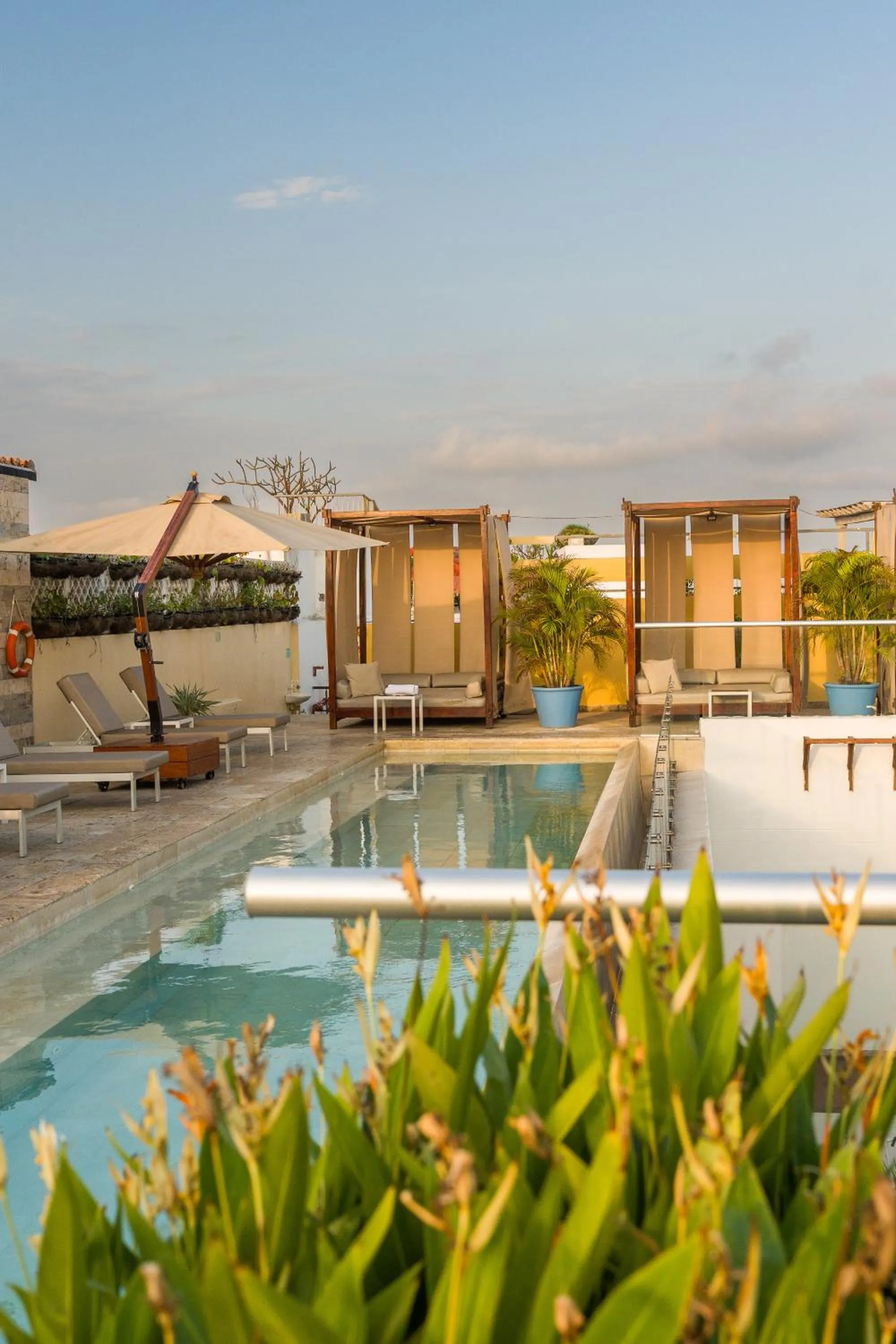 Swimming pool in Nacar Hotel Cartagena, Curio Collection by Hilton