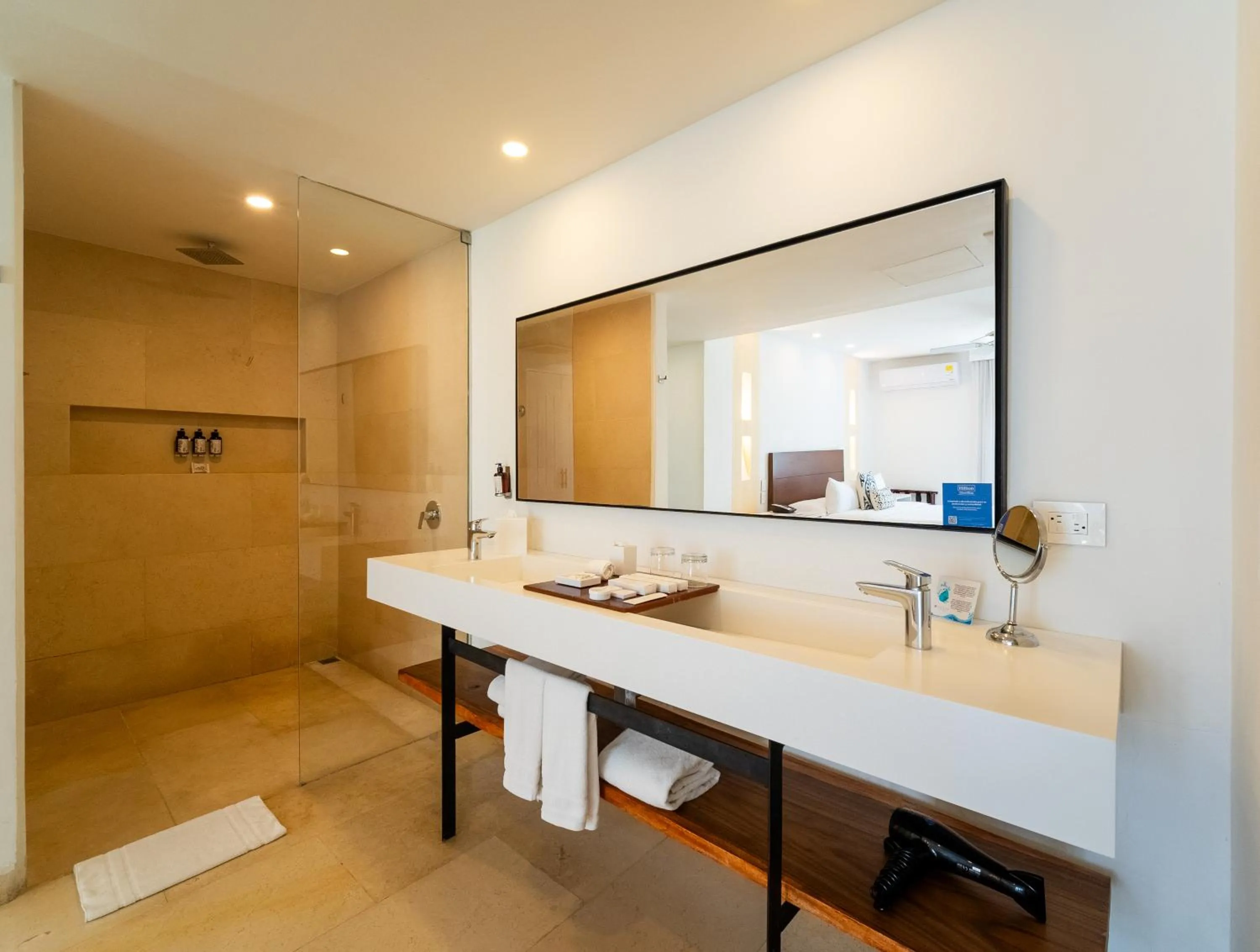 Bathroom in Nacar Hotel Cartagena, Curio Collection by Hilton
