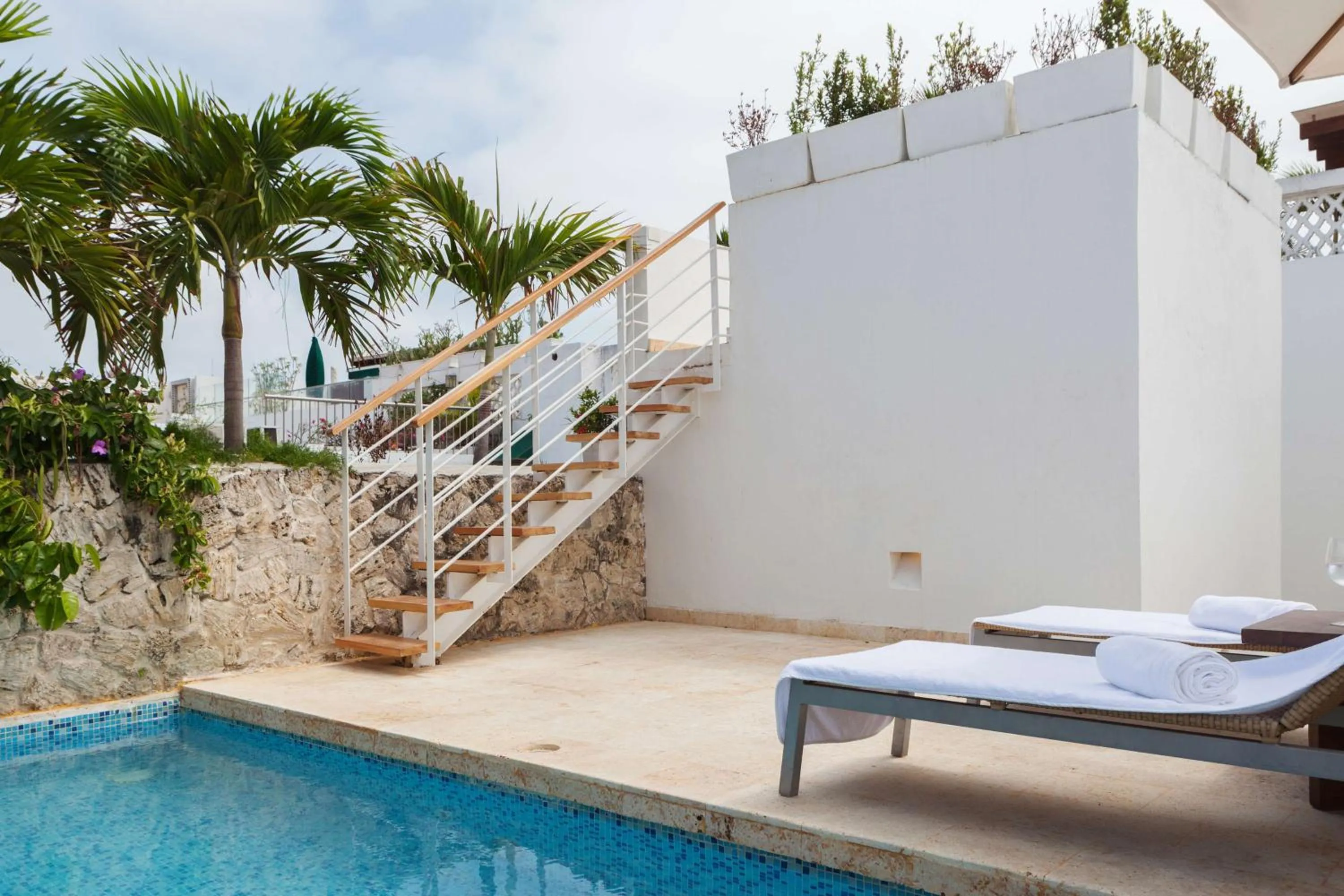 Pool view in Nacar Hotel Cartagena, Curio Collection by Hilton