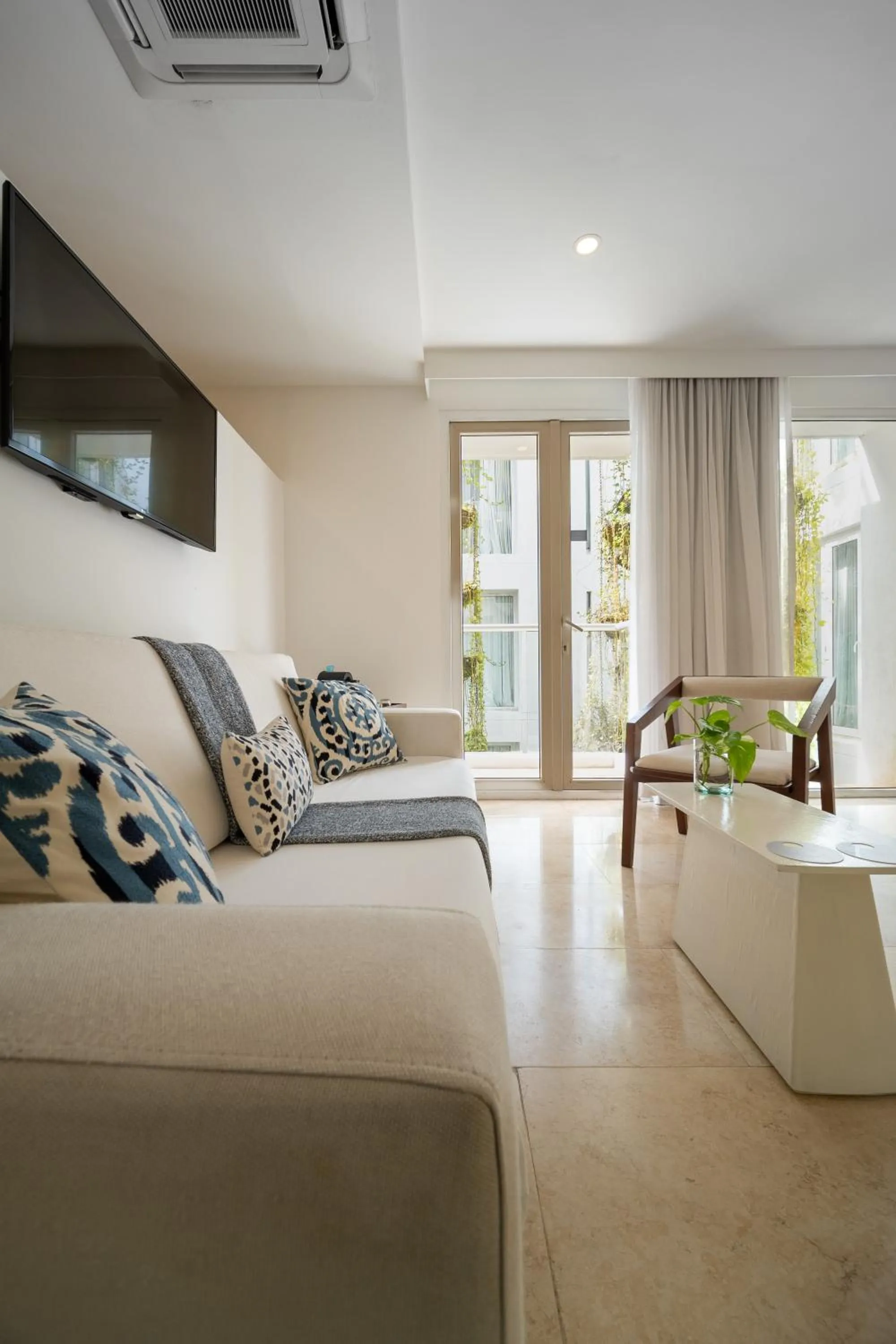 Living room in Nacar Hotel Cartagena, Curio Collection by Hilton