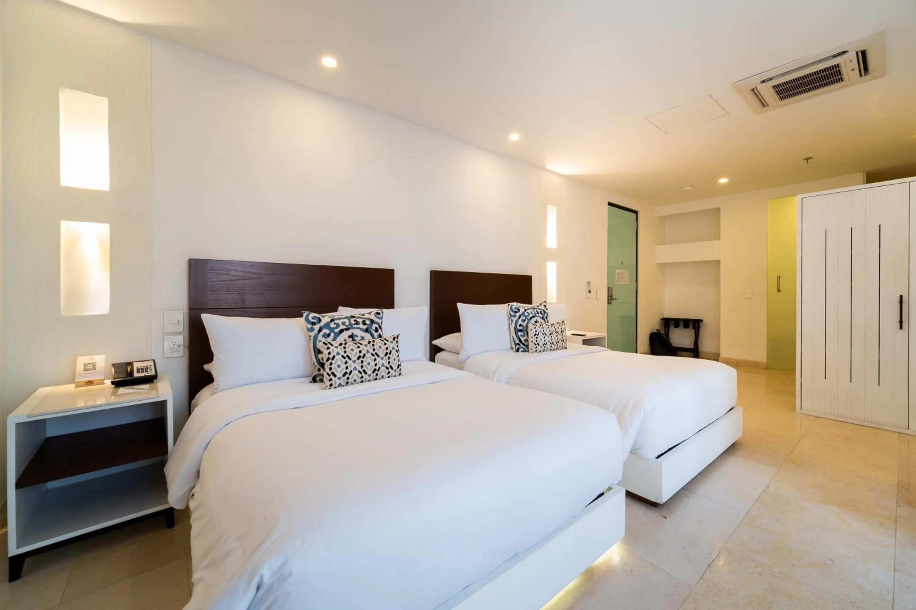 Photo of the whole room, Bed in Nacar Hotel Cartagena, Curio Collection by Hilton