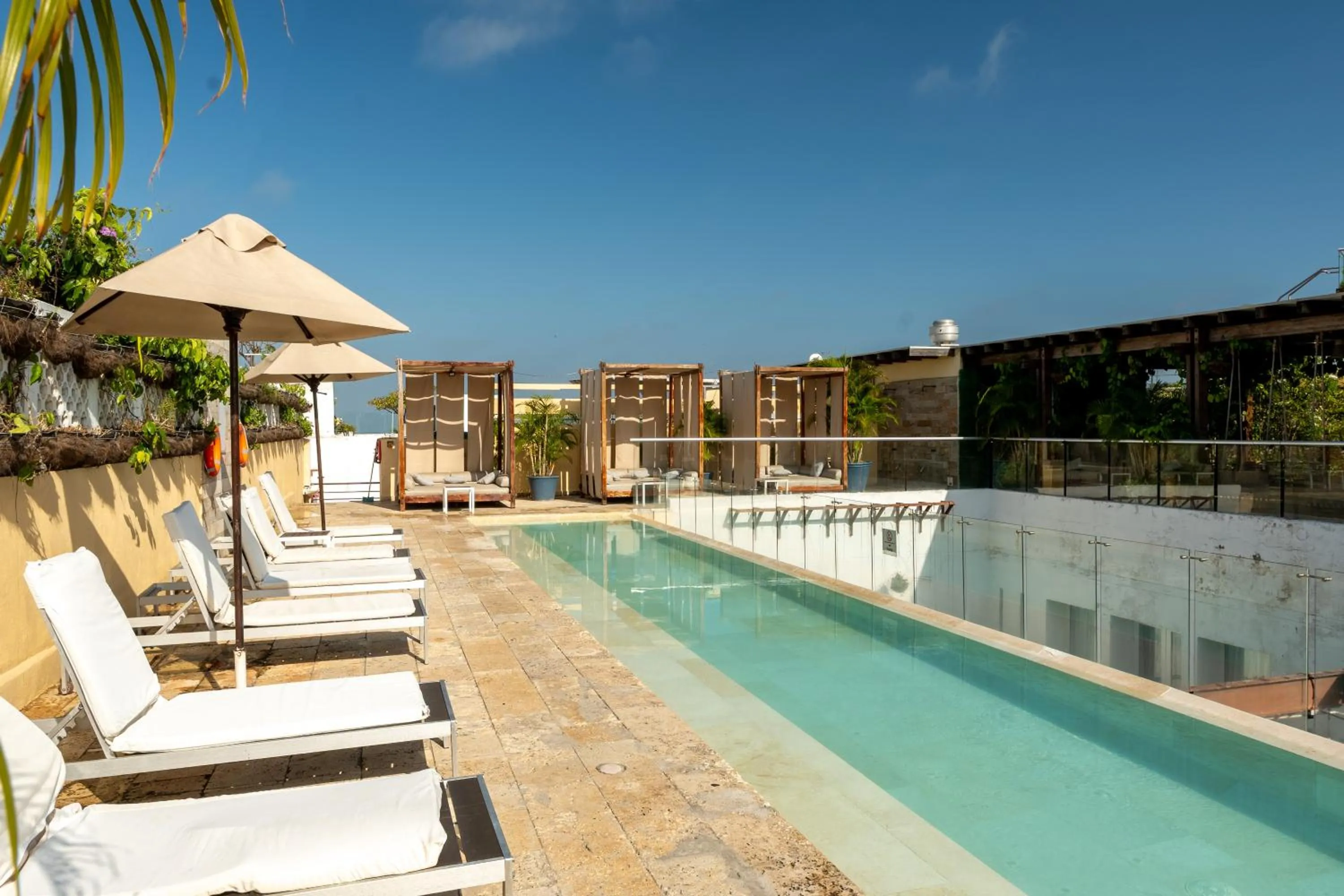 Swimming pool in Nacar Hotel Cartagena, Curio Collection by Hilton