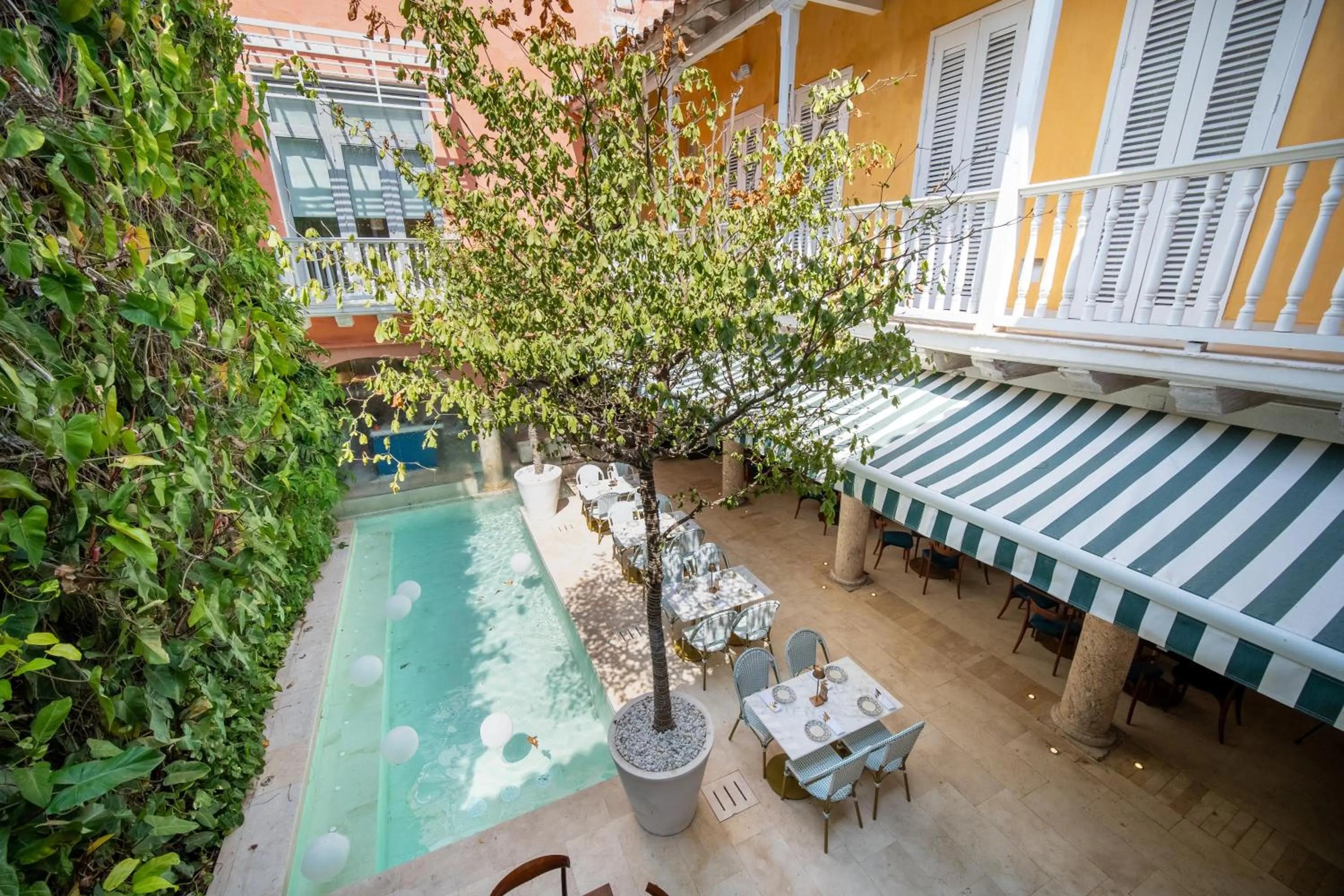 Swimming pool in Nacar Hotel Cartagena, Curio Collection by Hilton