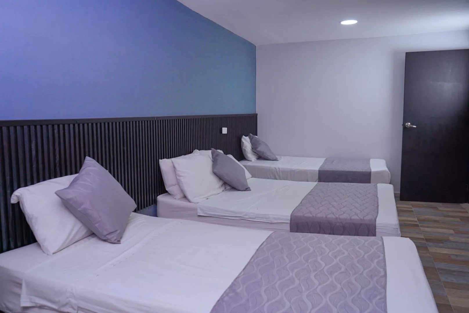 Bed in Hotel Palmas del Estadio