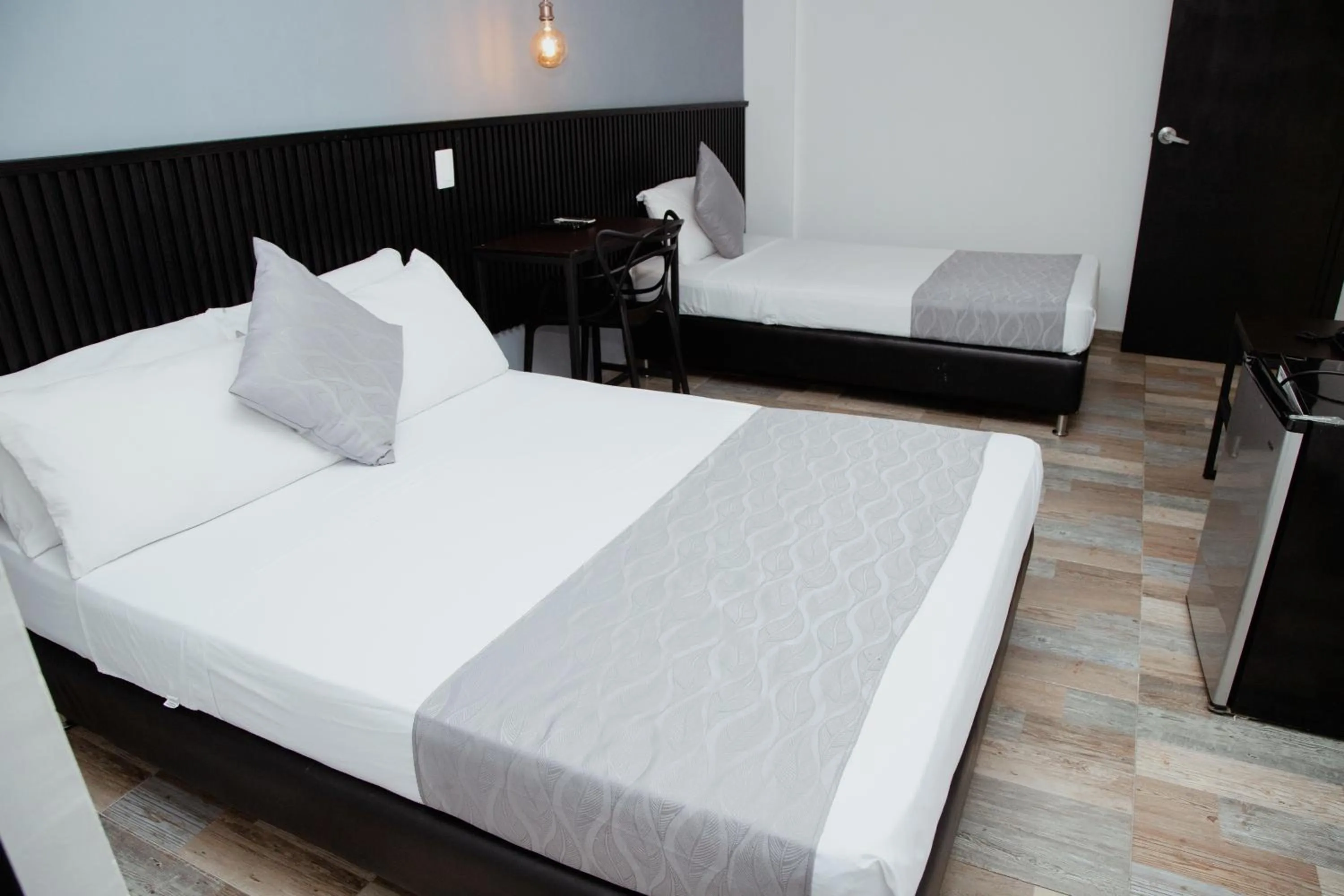 Bed in Hotel Palmas del Estadio