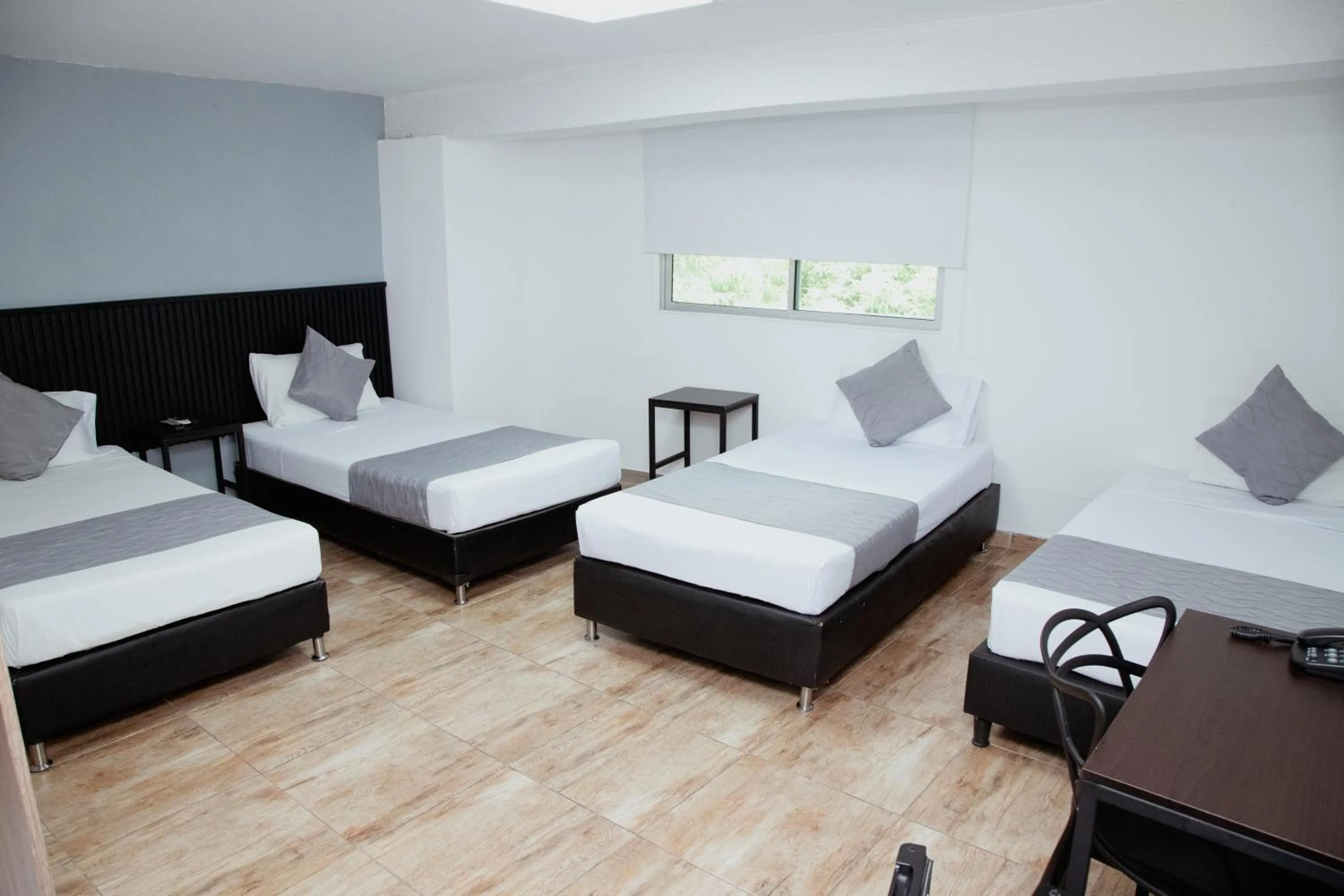 Bed in Hotel Palmas del Estadio