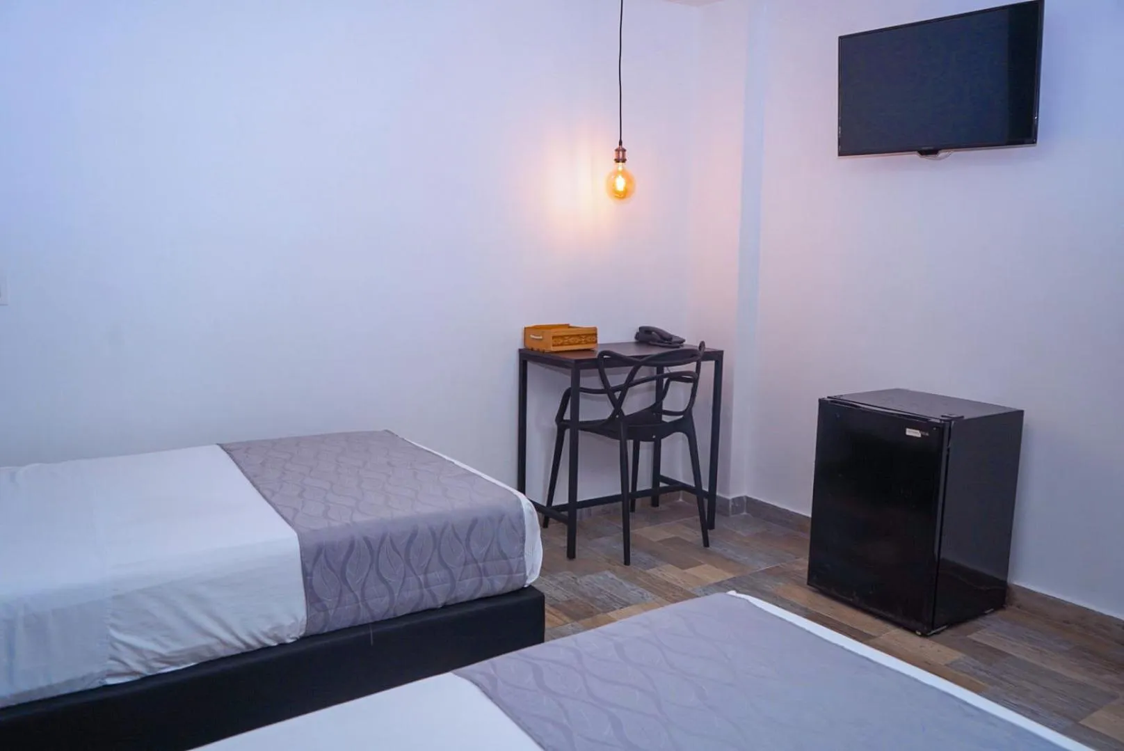 Bed in Hotel Palmas del Estadio