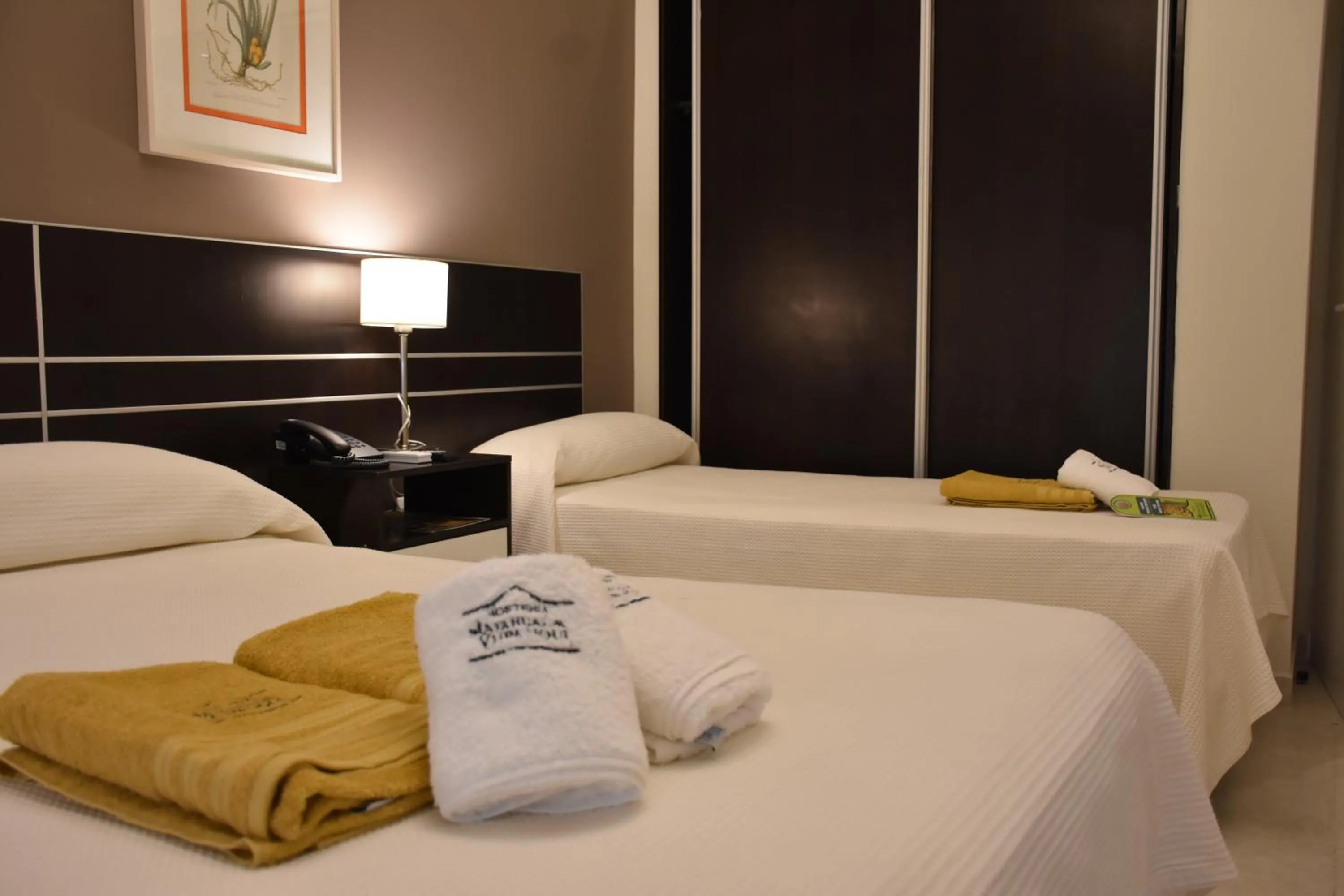 Photo of the whole room, Bed in Hostería Atahualpa Yupanqui