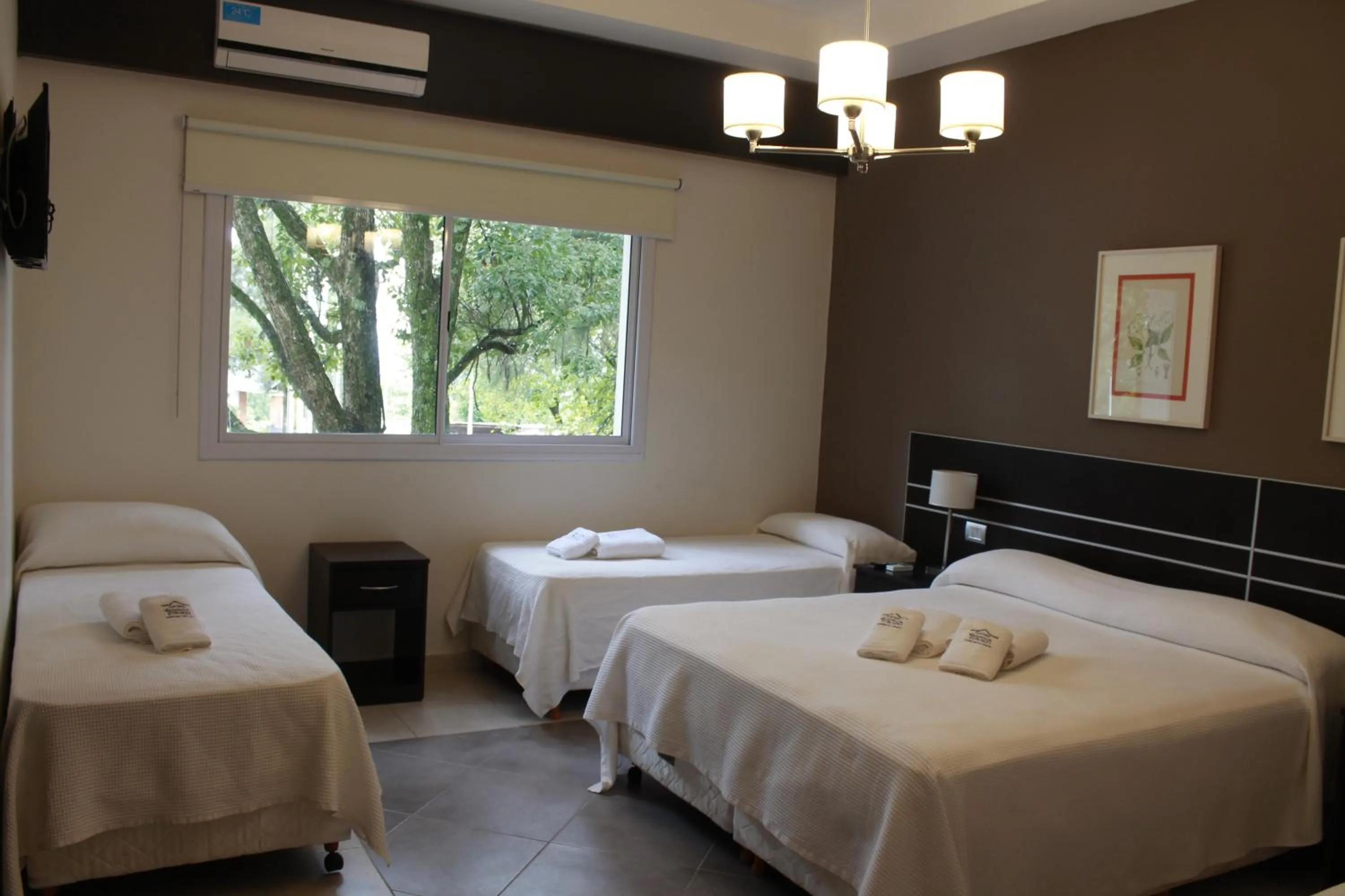 Bed in Hostería Atahualpa Yupanqui