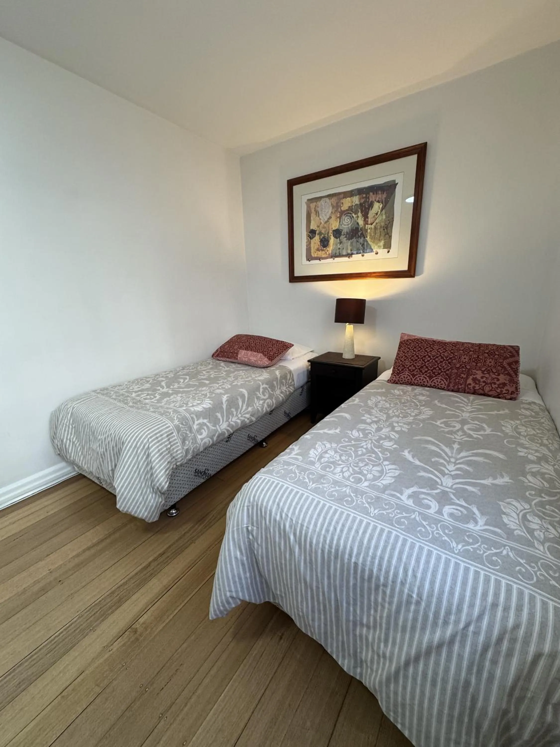 Bed in Knightsbridge Apartments