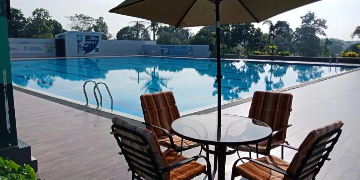Swimming pool in APM Equestrian Resort