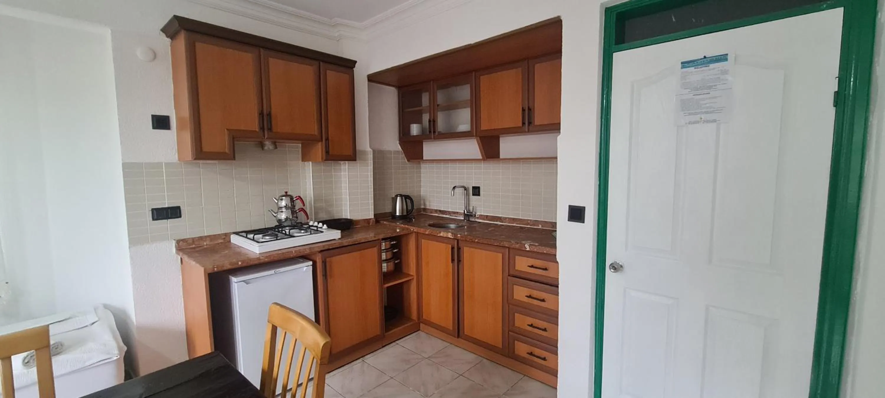 kitchen in California Apart Otel