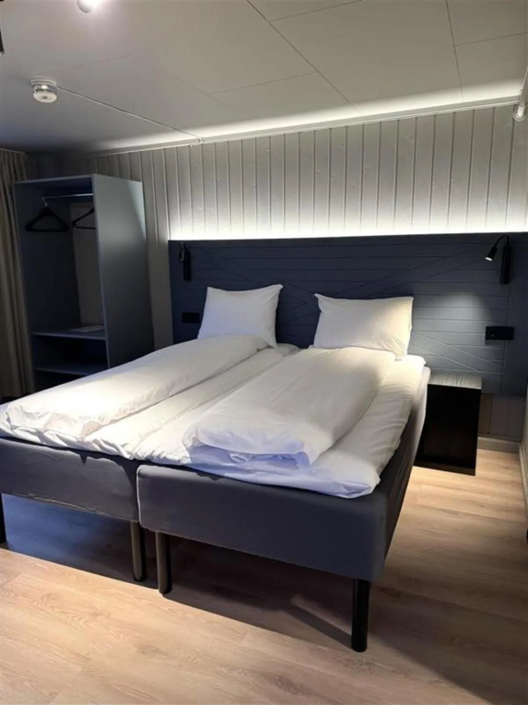 Bed in Grønnbuene Rorbu Hotel