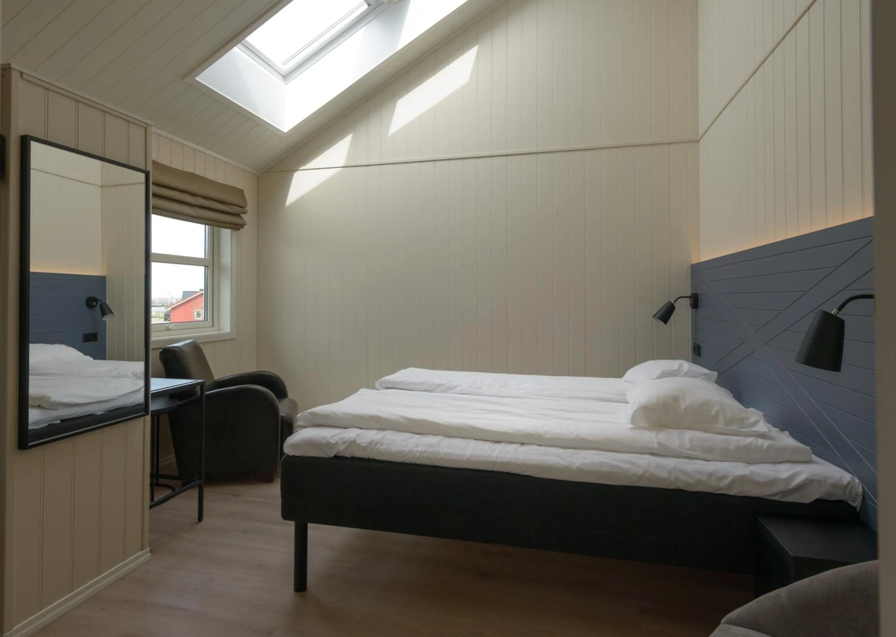 Bed in Grønnbuene Rorbu Hotel