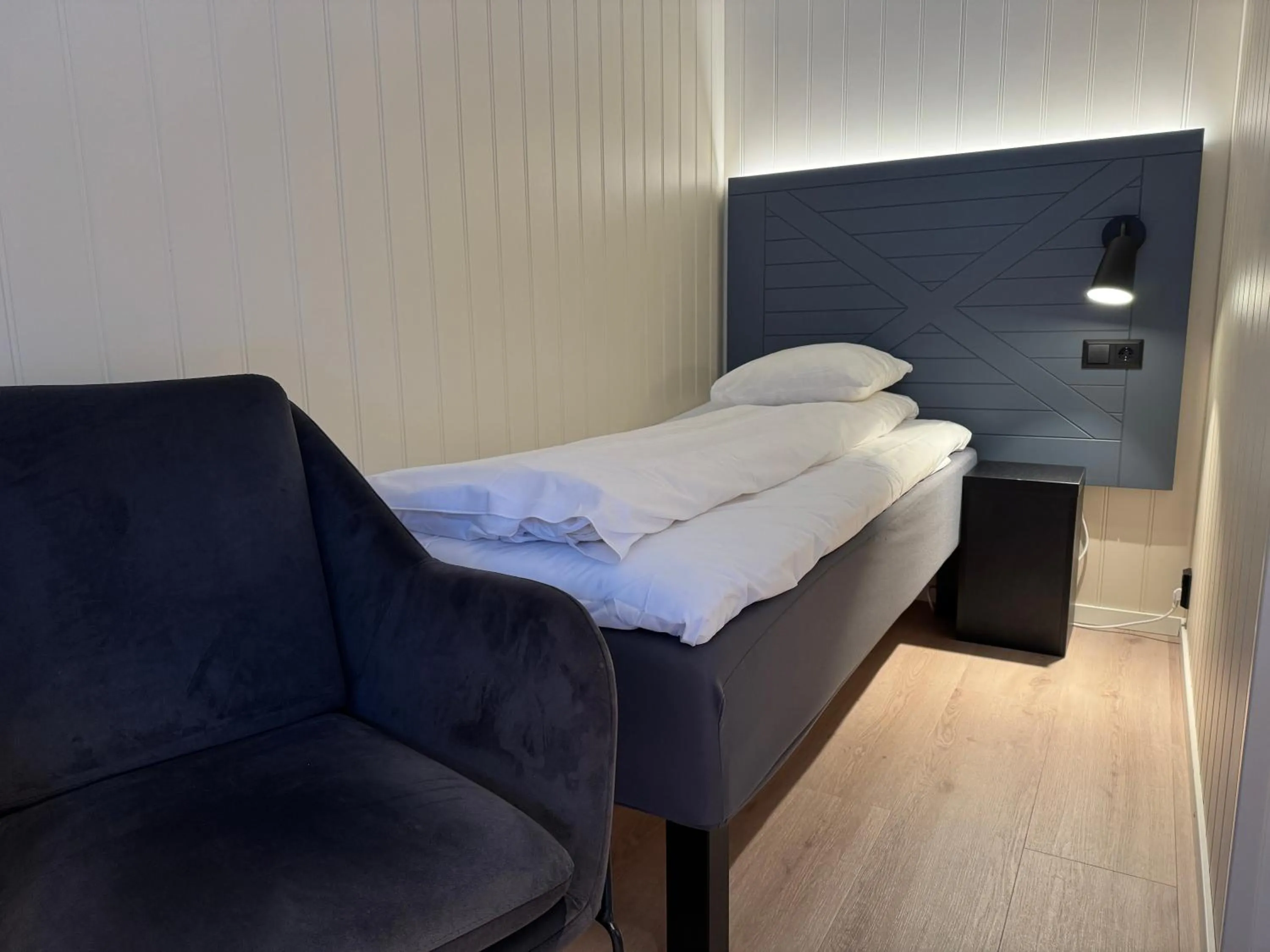 Bed in Grønnbuene Rorbu Hotel