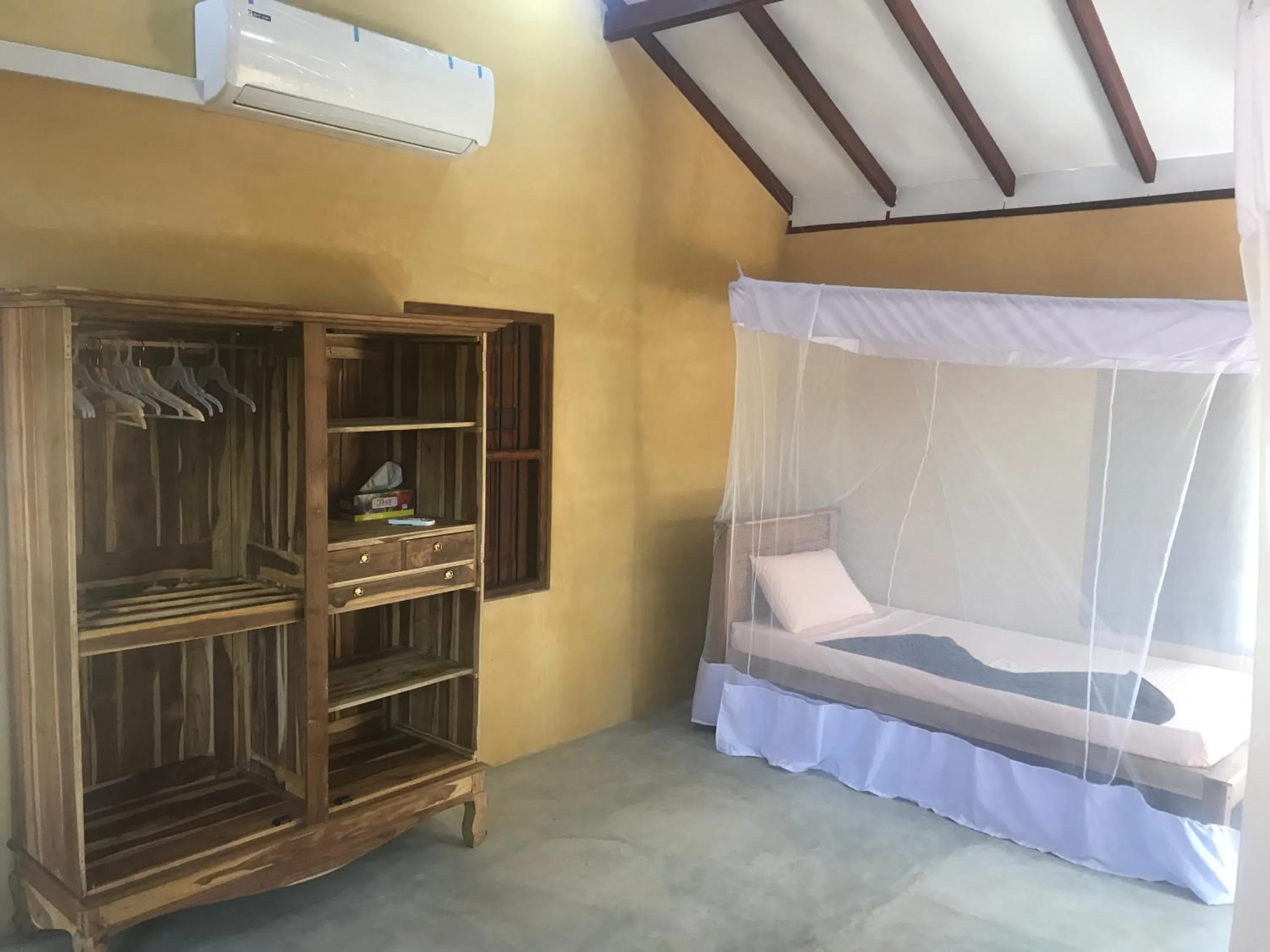 Bed in Kitelantis Hotel and Resort