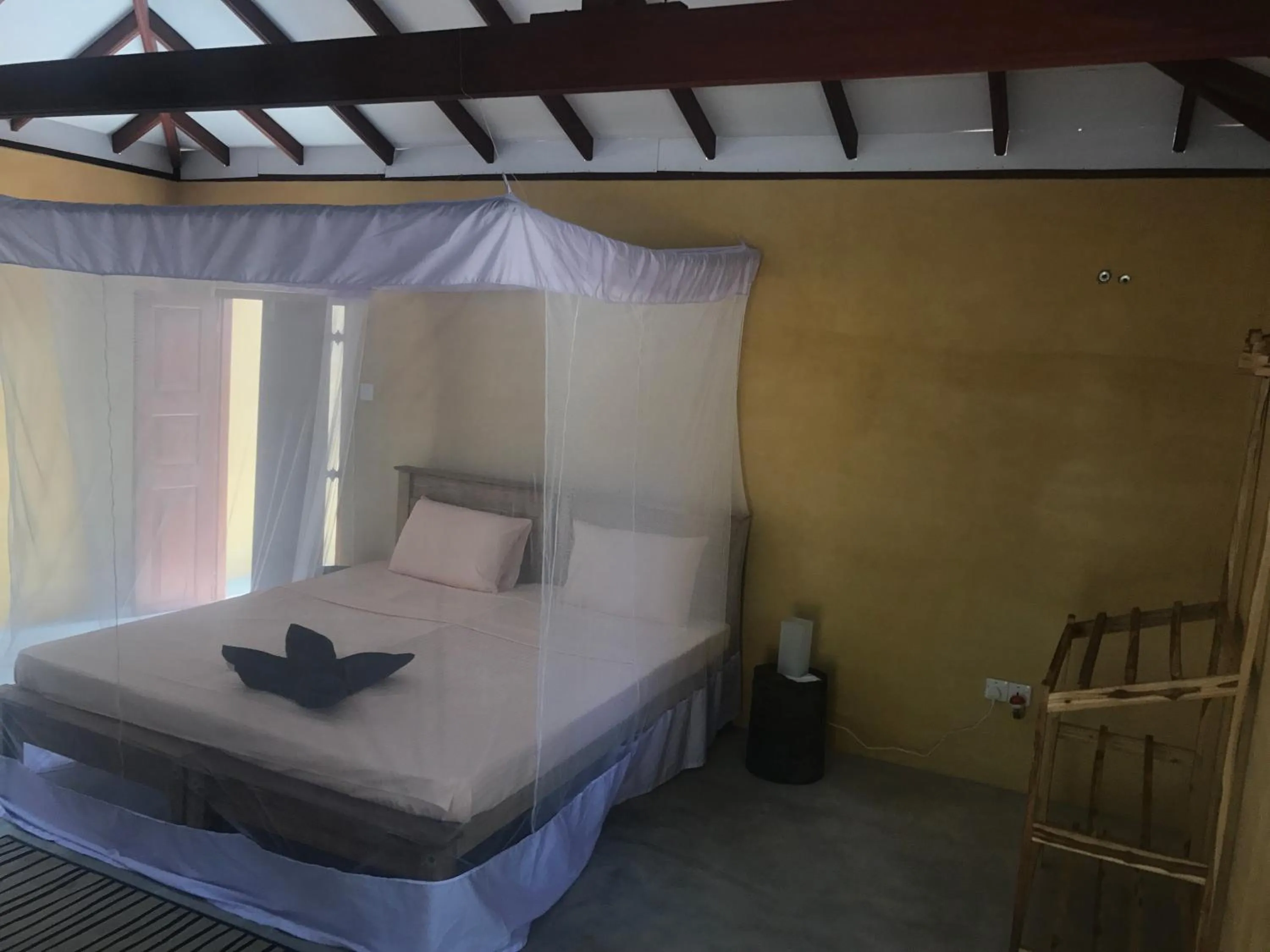 Bed in Kitelantis Hotel and Resort