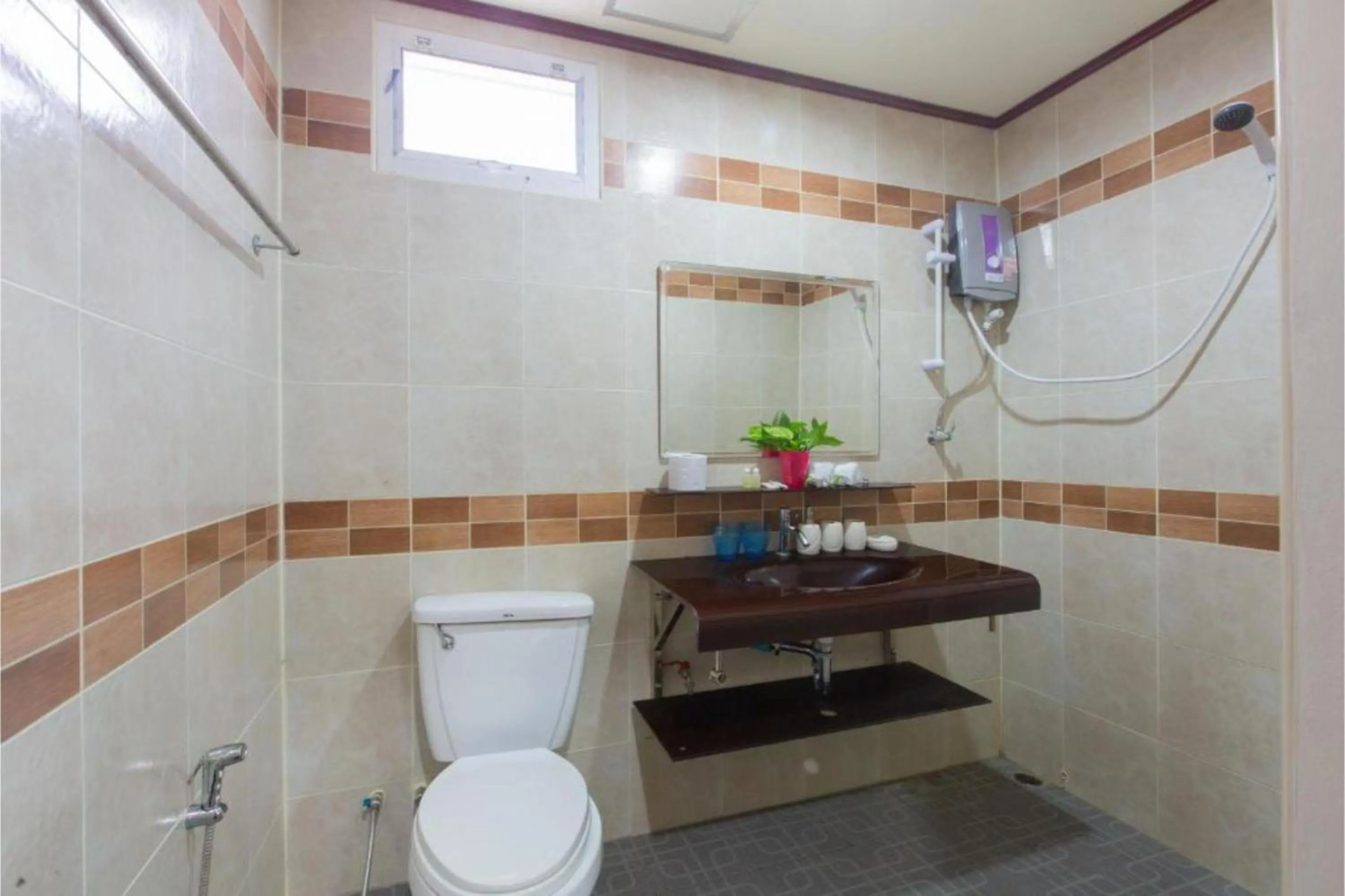 Bathroom in Patong Rai Rom Yen Resort SHA