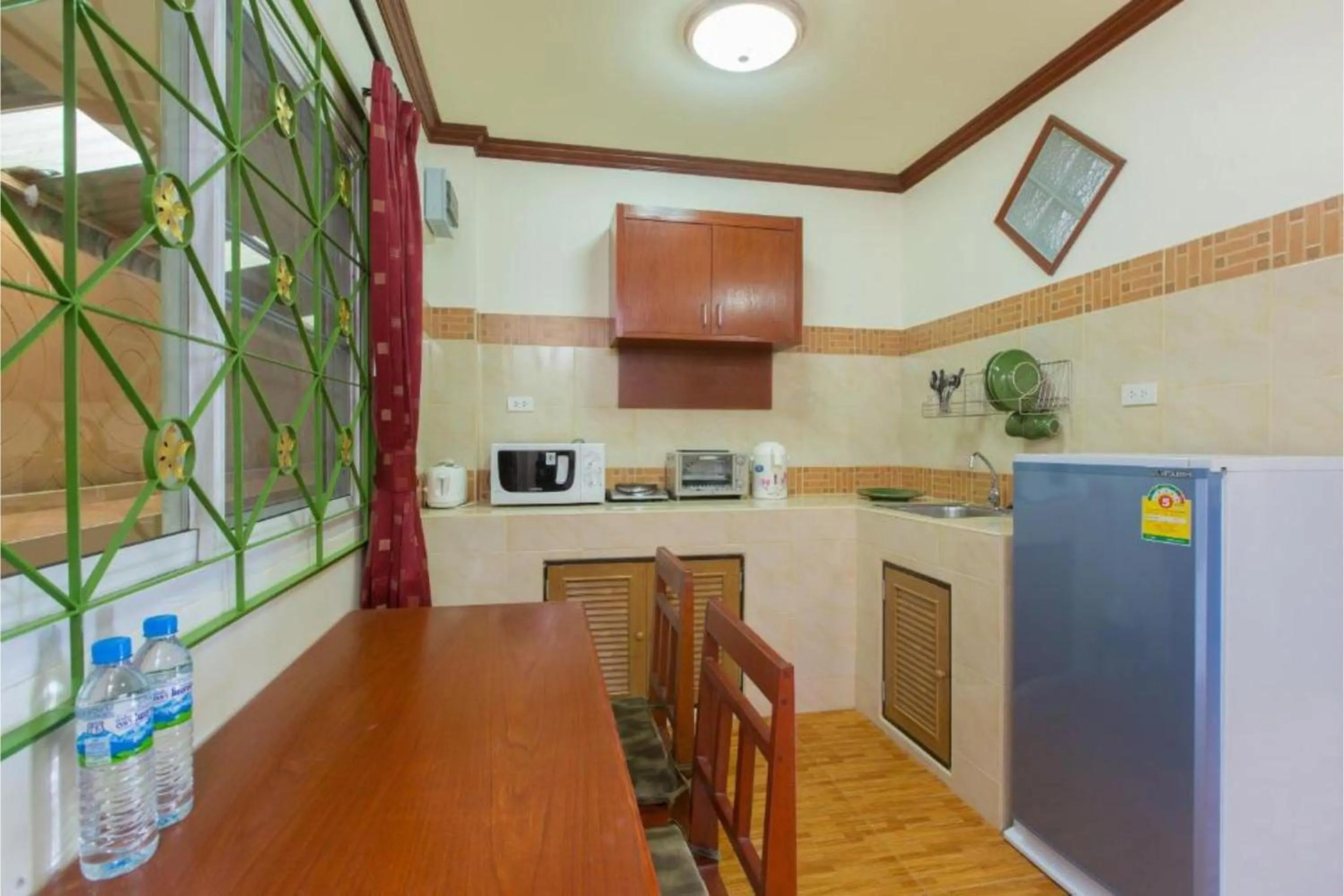 Kitchen or kitchenette in Patong Rai Rom Yen Resort SHA