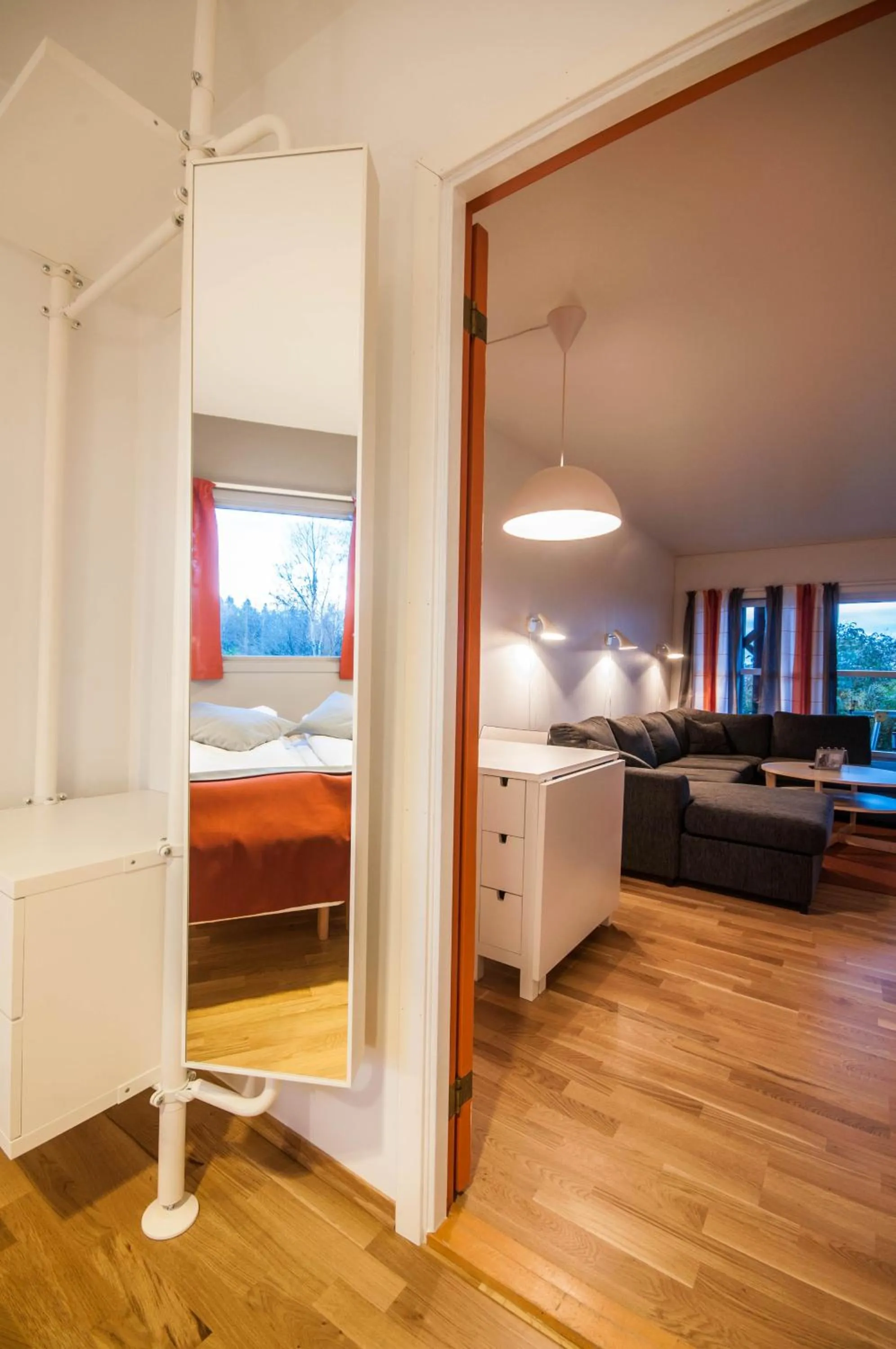 Living room, Bed in Dolmsundet Hotell Hitra