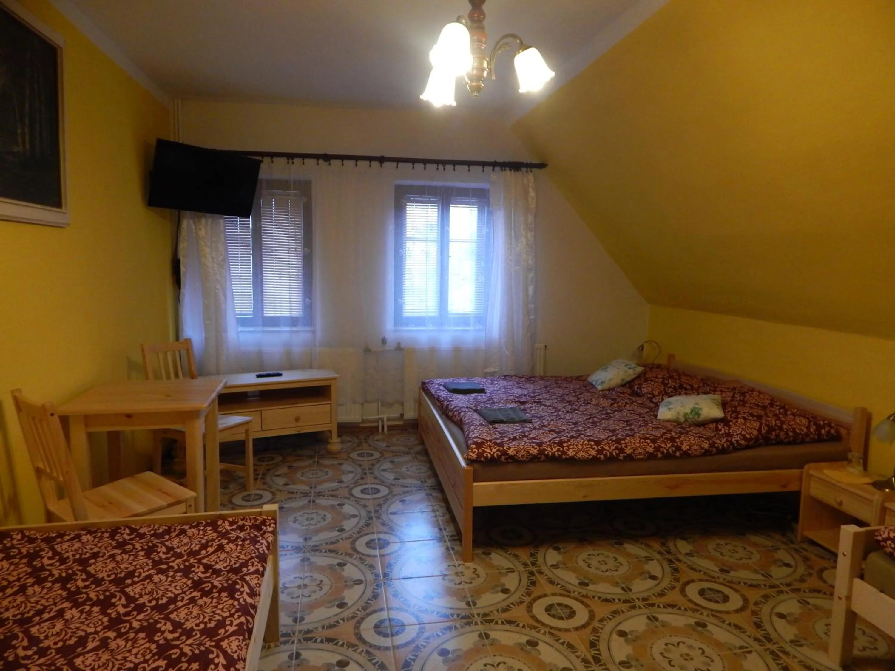 Quadruple Room - single occupancy in Penzion Dřevěnka
