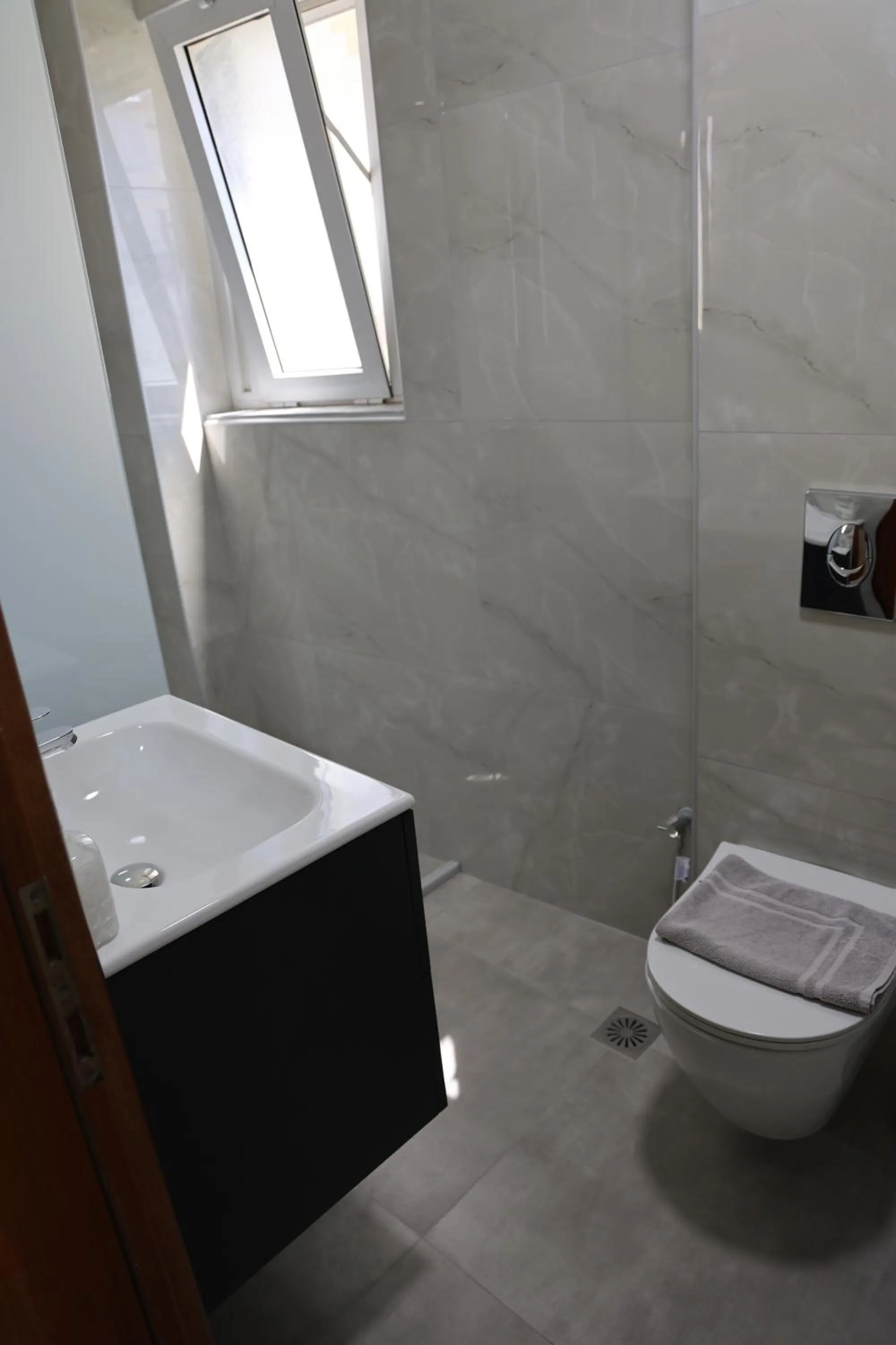 Toilet in Marie Hotel