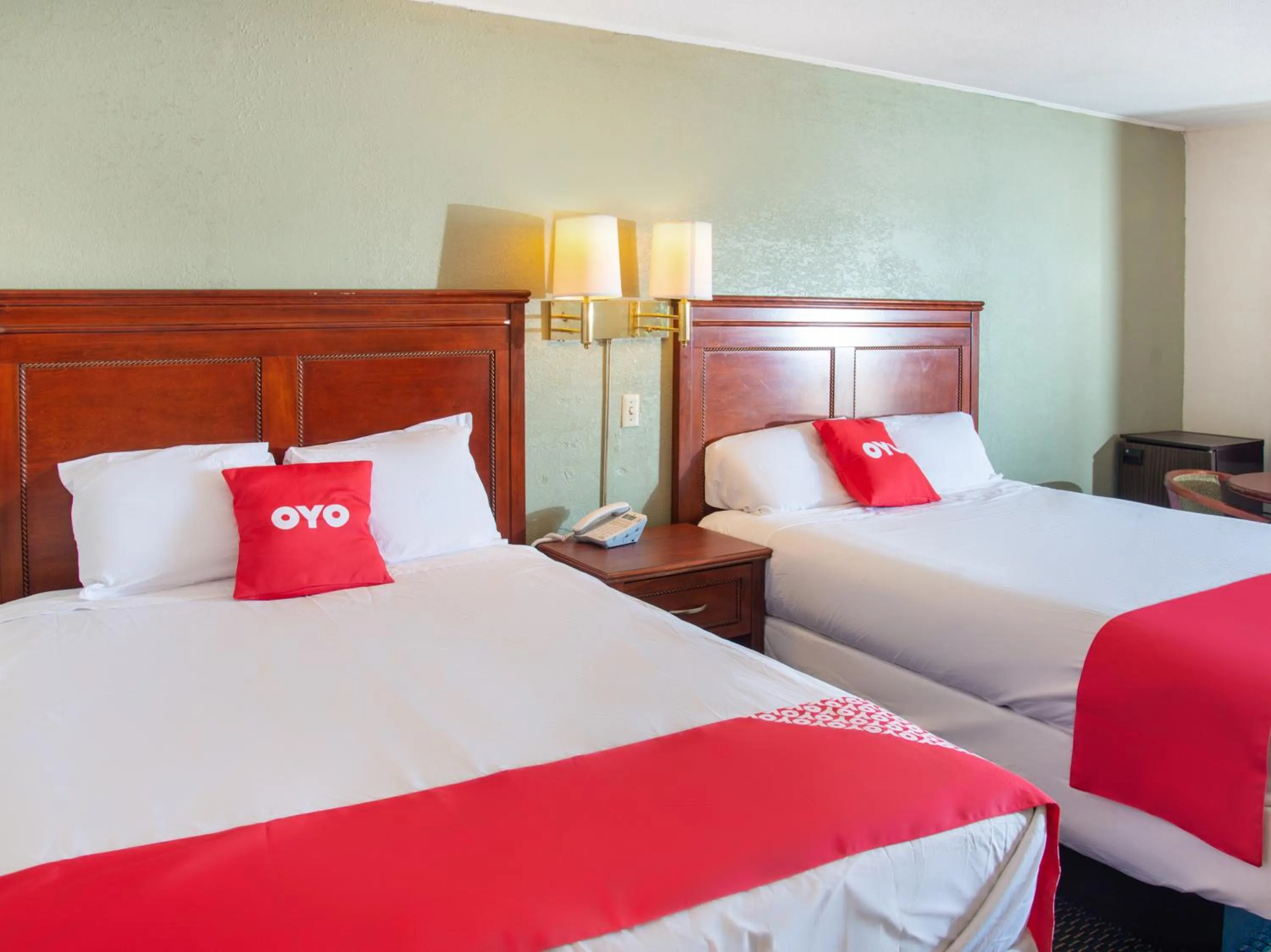 Bedroom in Rest Inn - Extended Stay, I-40 Airport, Wedding & Event Center