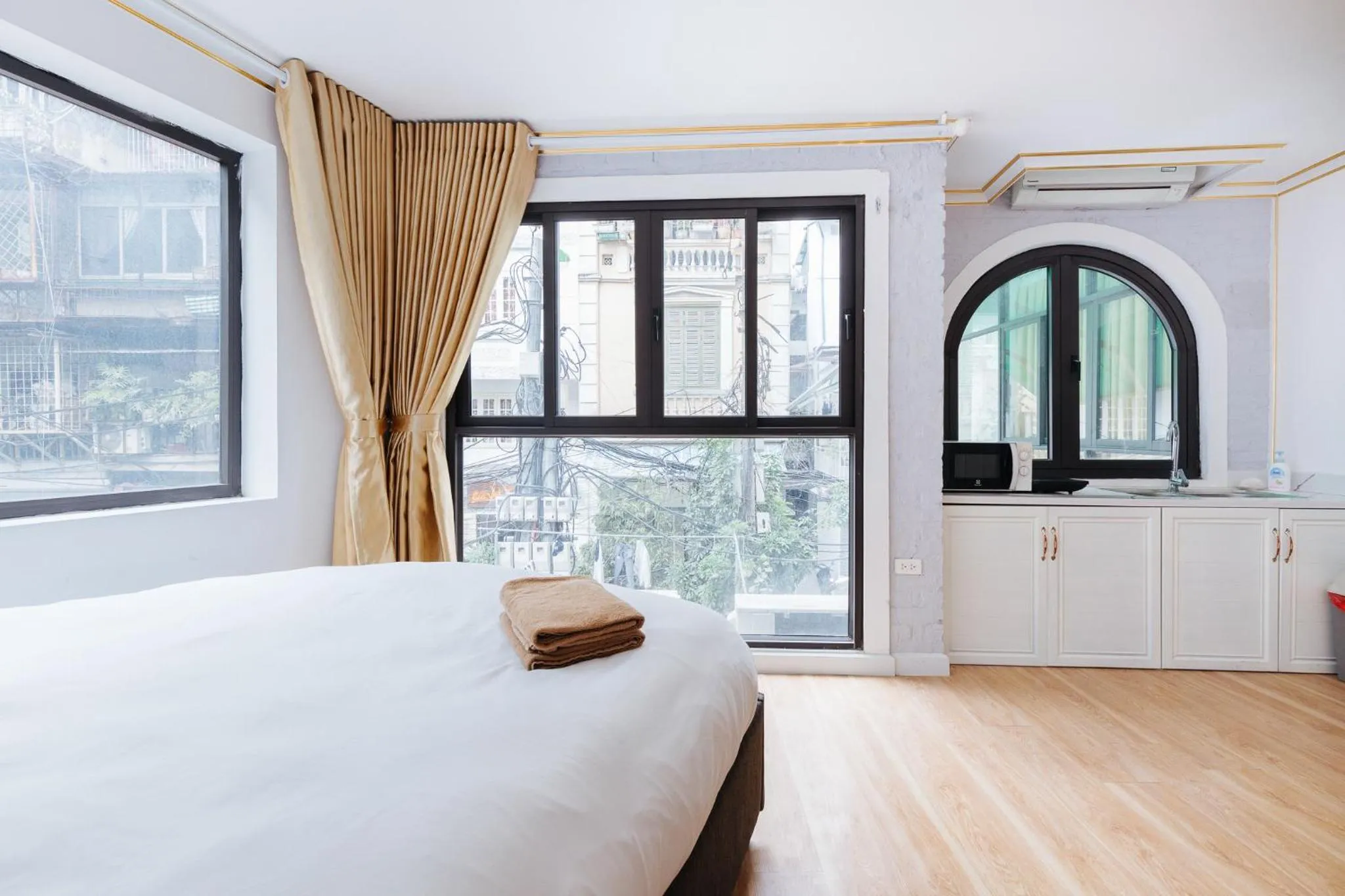 Bed in SaziHome Le Thanh Tong Hanoi