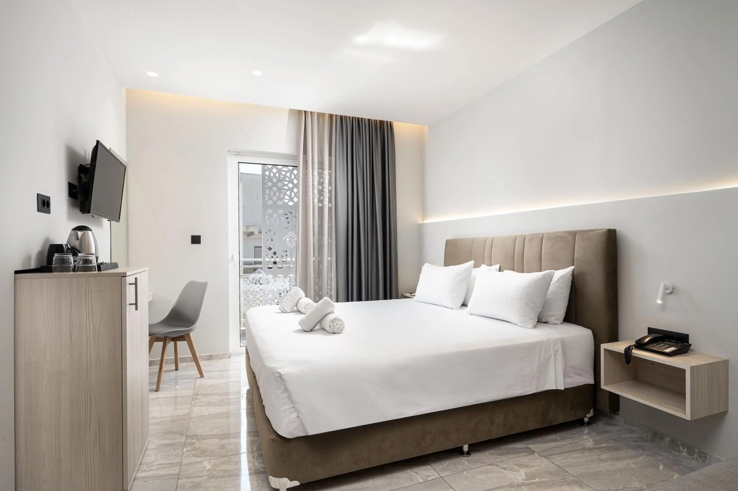 Bed in Sonia Hotel & Suites - Adults Only