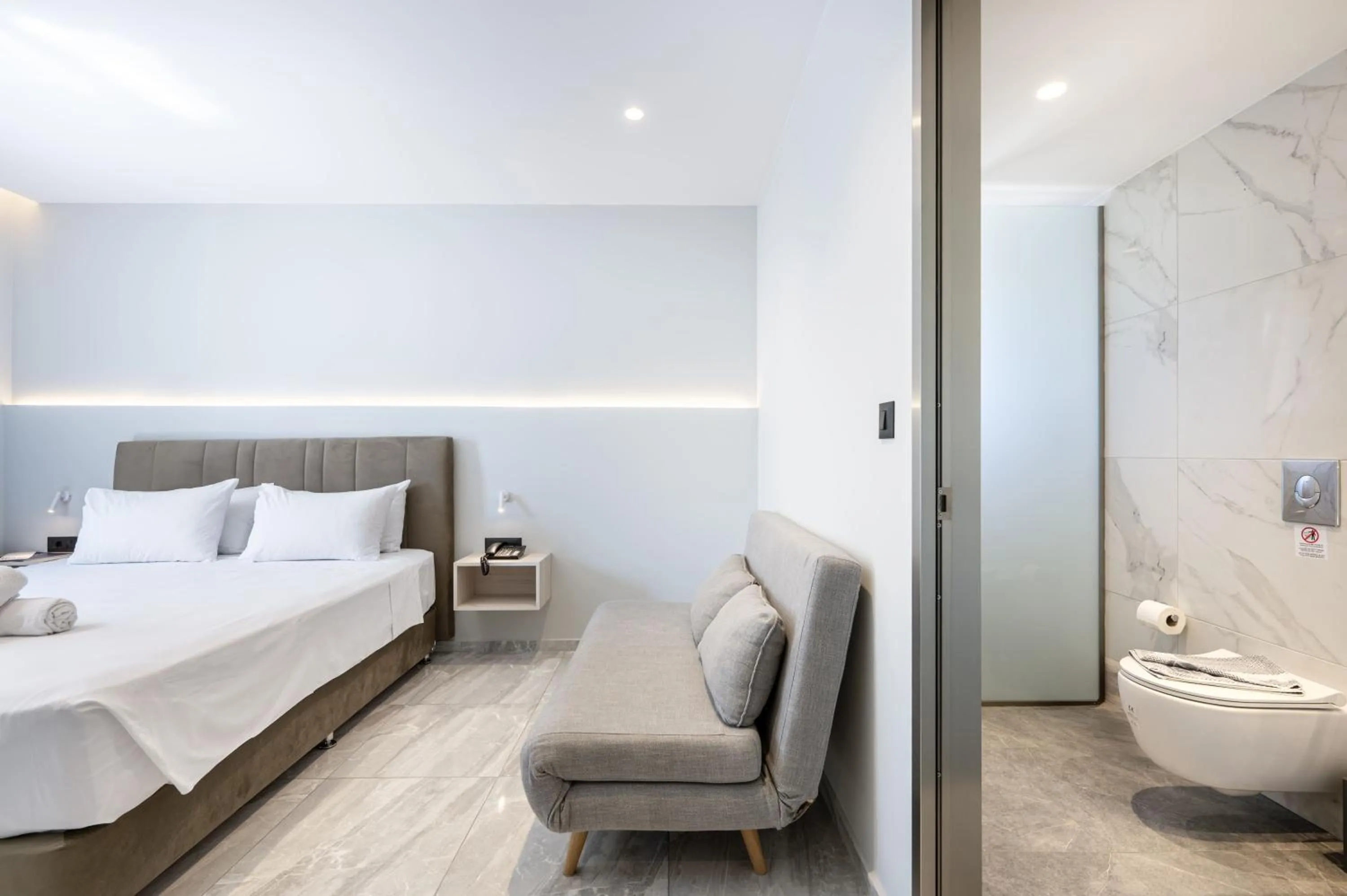 Toilet, Bed in Sonia Hotel & Suites - Adults Only