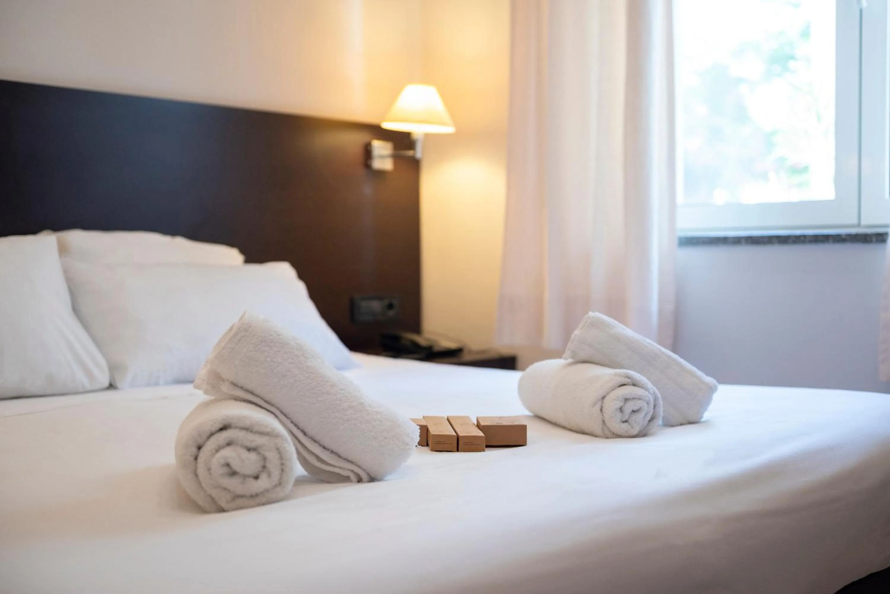 Bed in Sonia Hotel & Suites - Adults Only