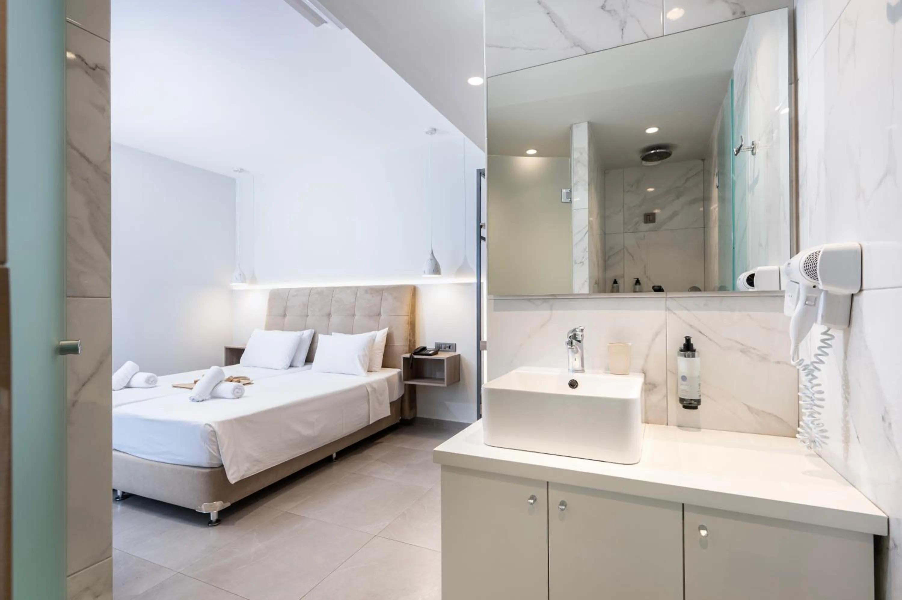 Bed in Sonia Hotel & Suites - Adults Only