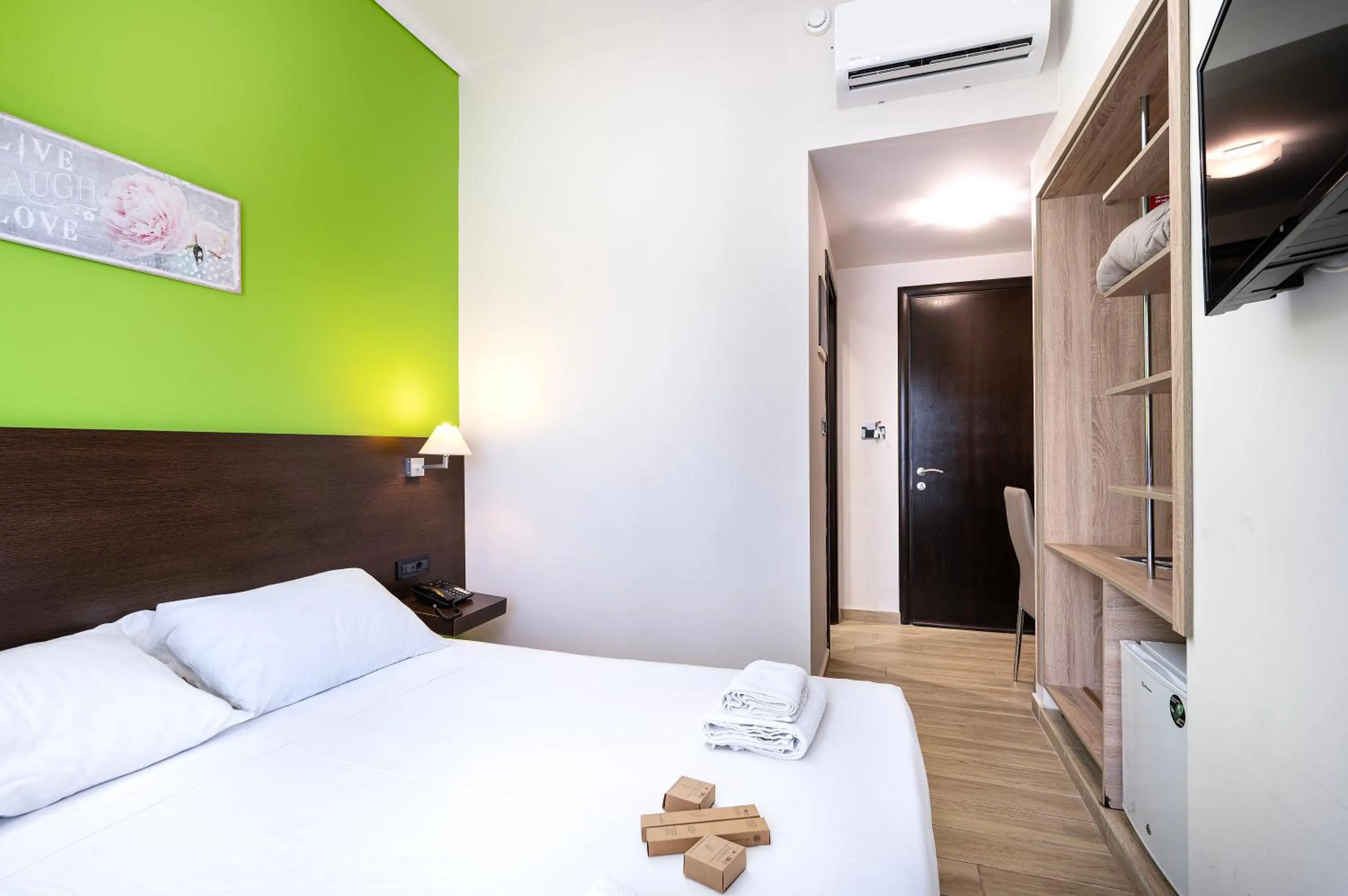 Bed in Sonia Hotel & Suites - Adults Only