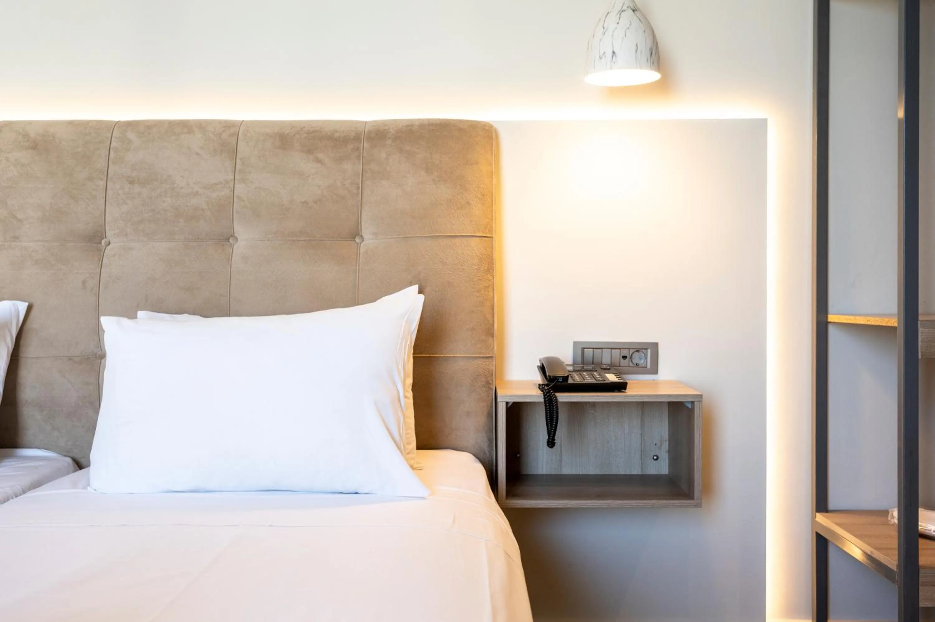 Bed in Sonia Hotel & Suites - Adults Only