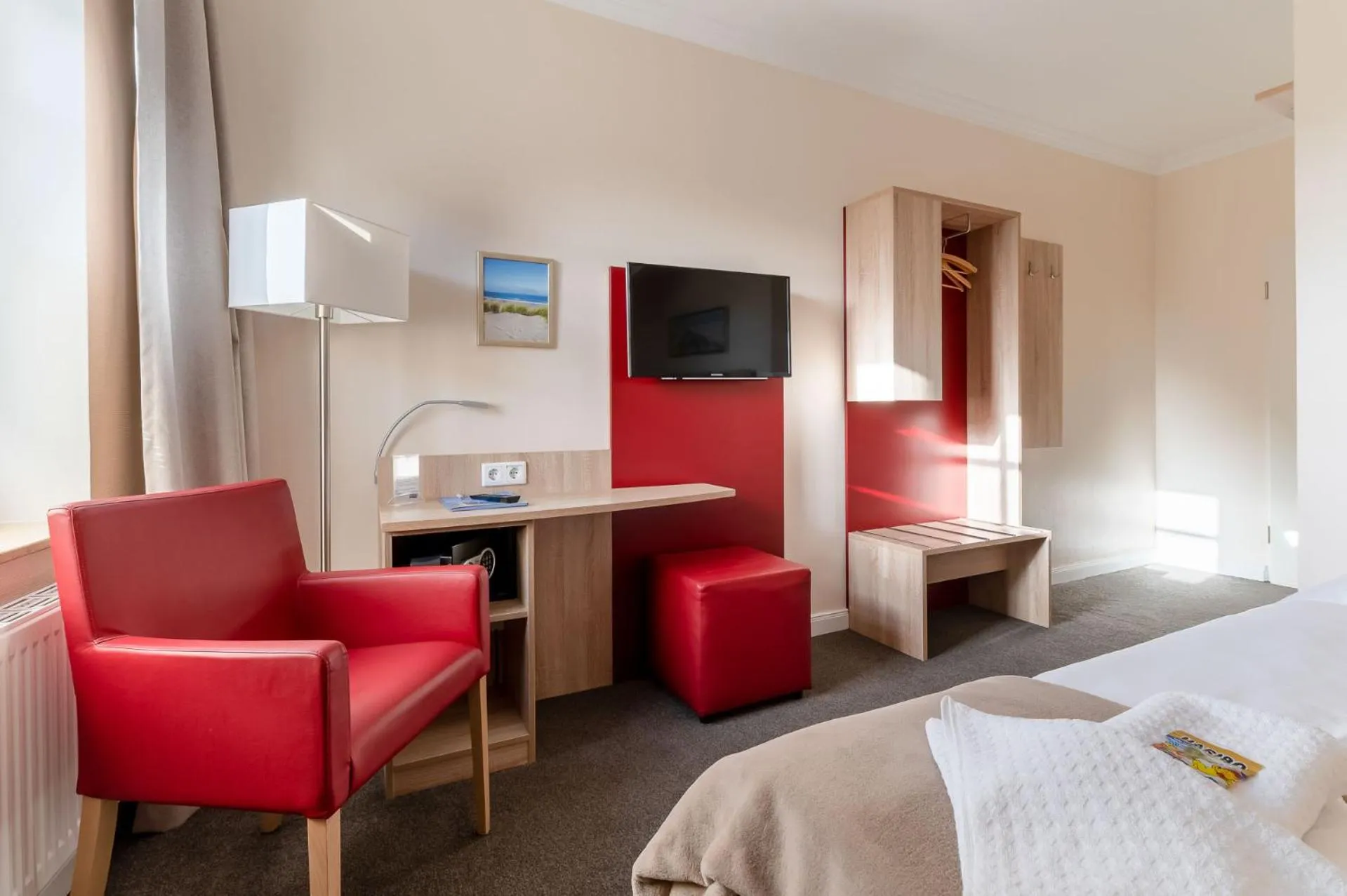 Photo of the whole room, Bed in Nordsee-Hotel Hinrichsen