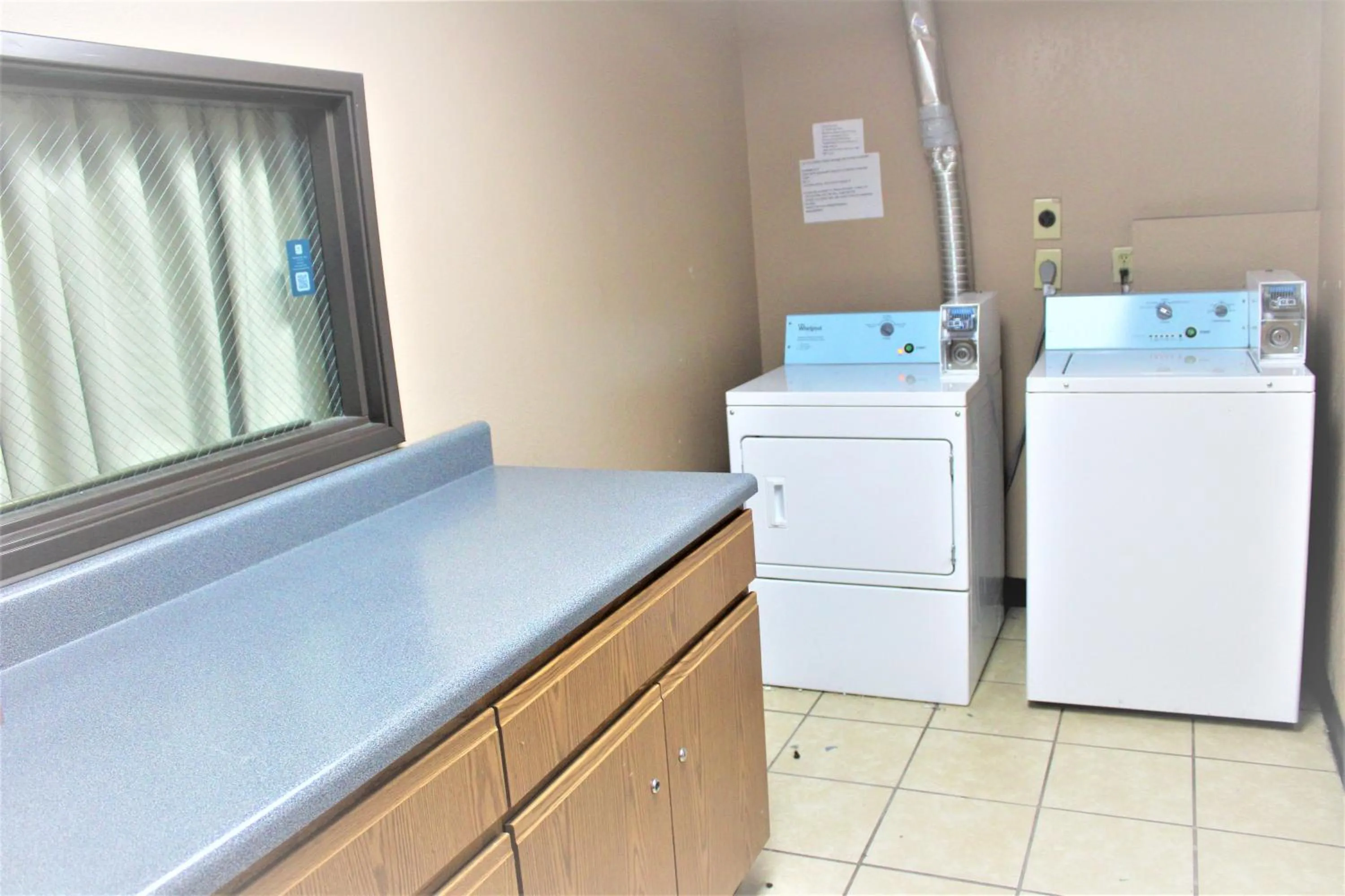 laundry in Super 8 by Wyndham Burlington