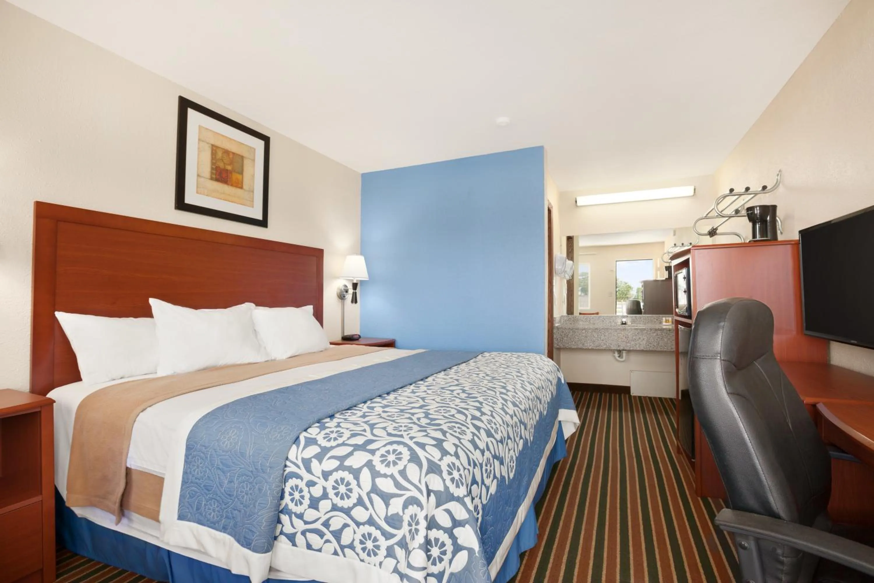 Decorative detail, Bed in Days Inn by Wyndham Champaign/Urbana