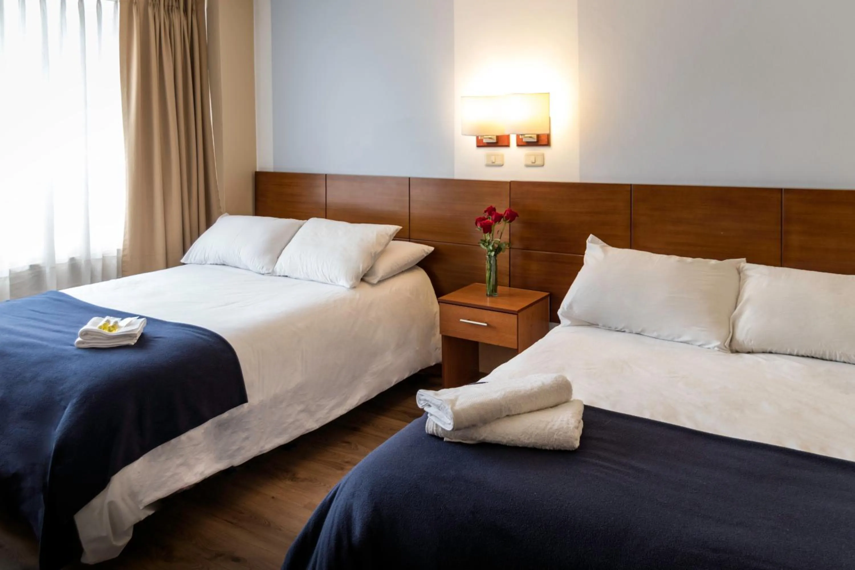 Bed in Filatelia Suites & Travel